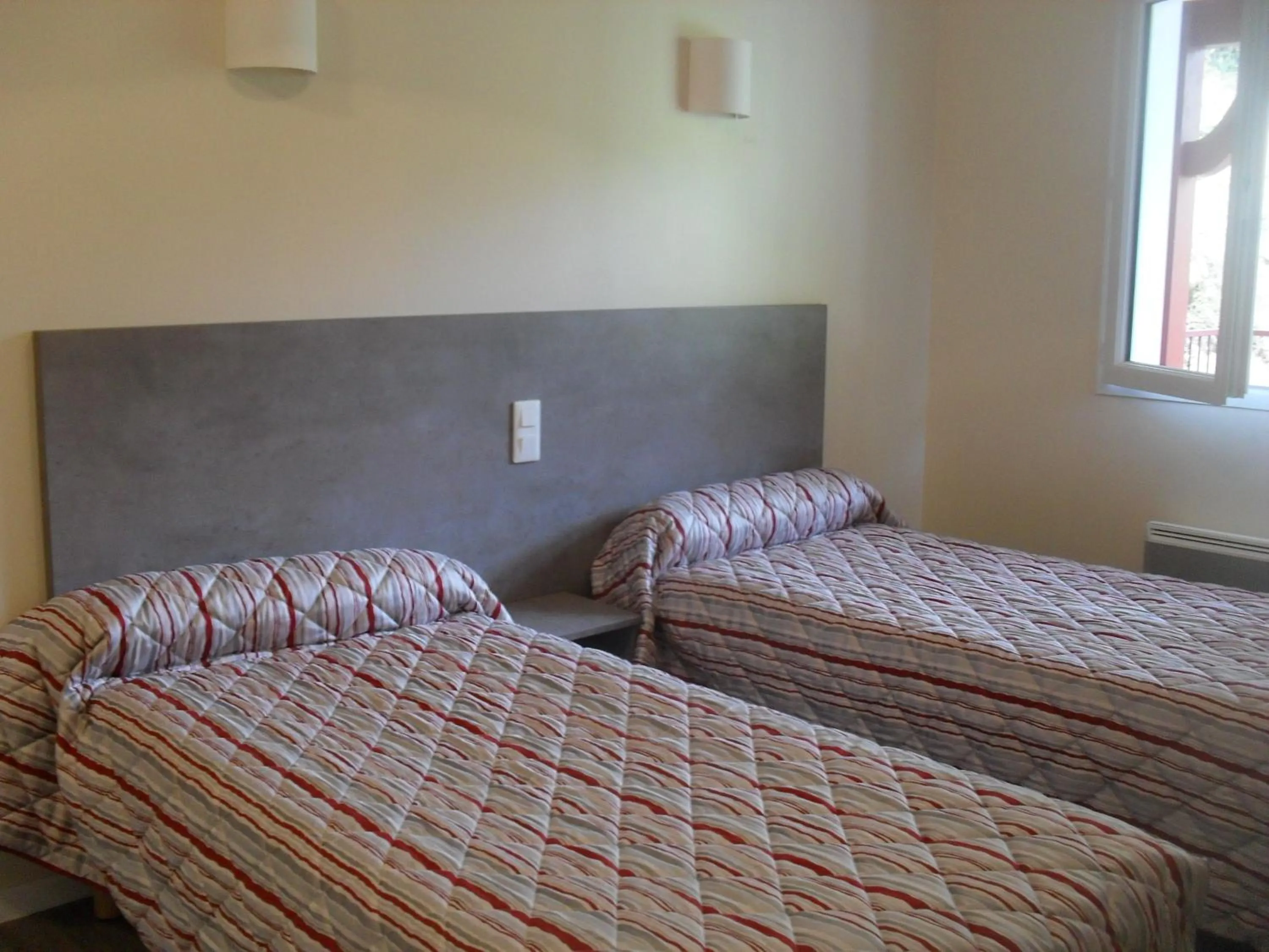 Photo of the whole room, Bed in Logis Hôtel Andreinia & Cabanes