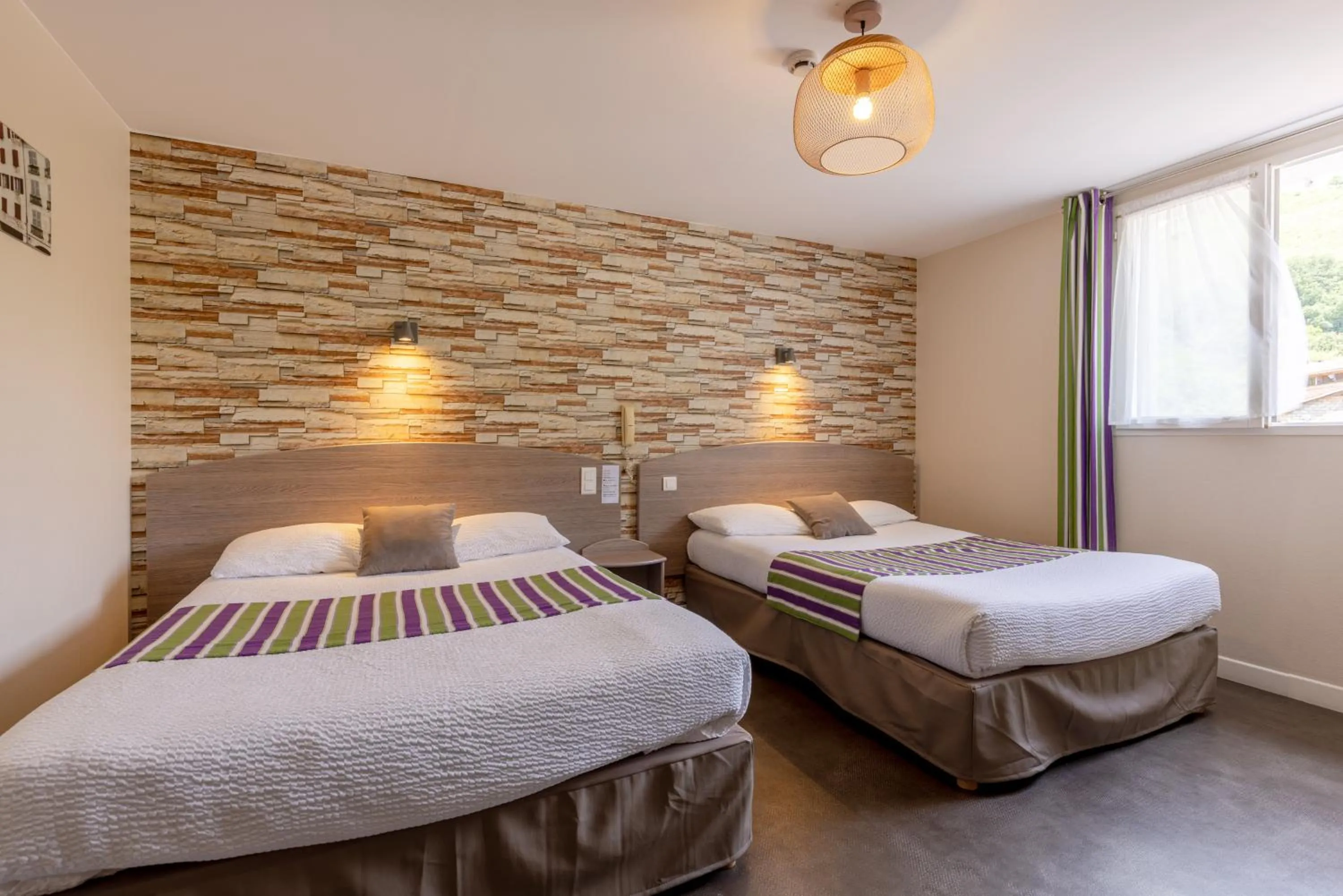 Property building, Bed in Logis Hôtel Andreinia & Cabanes