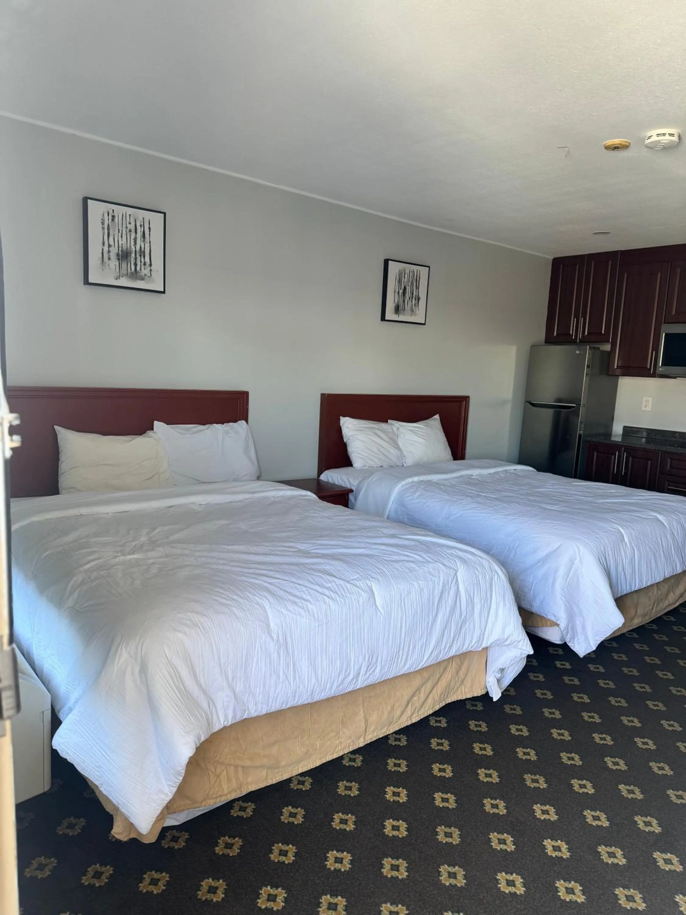 Bedroom, Bed in Niagara Lodge & Suites