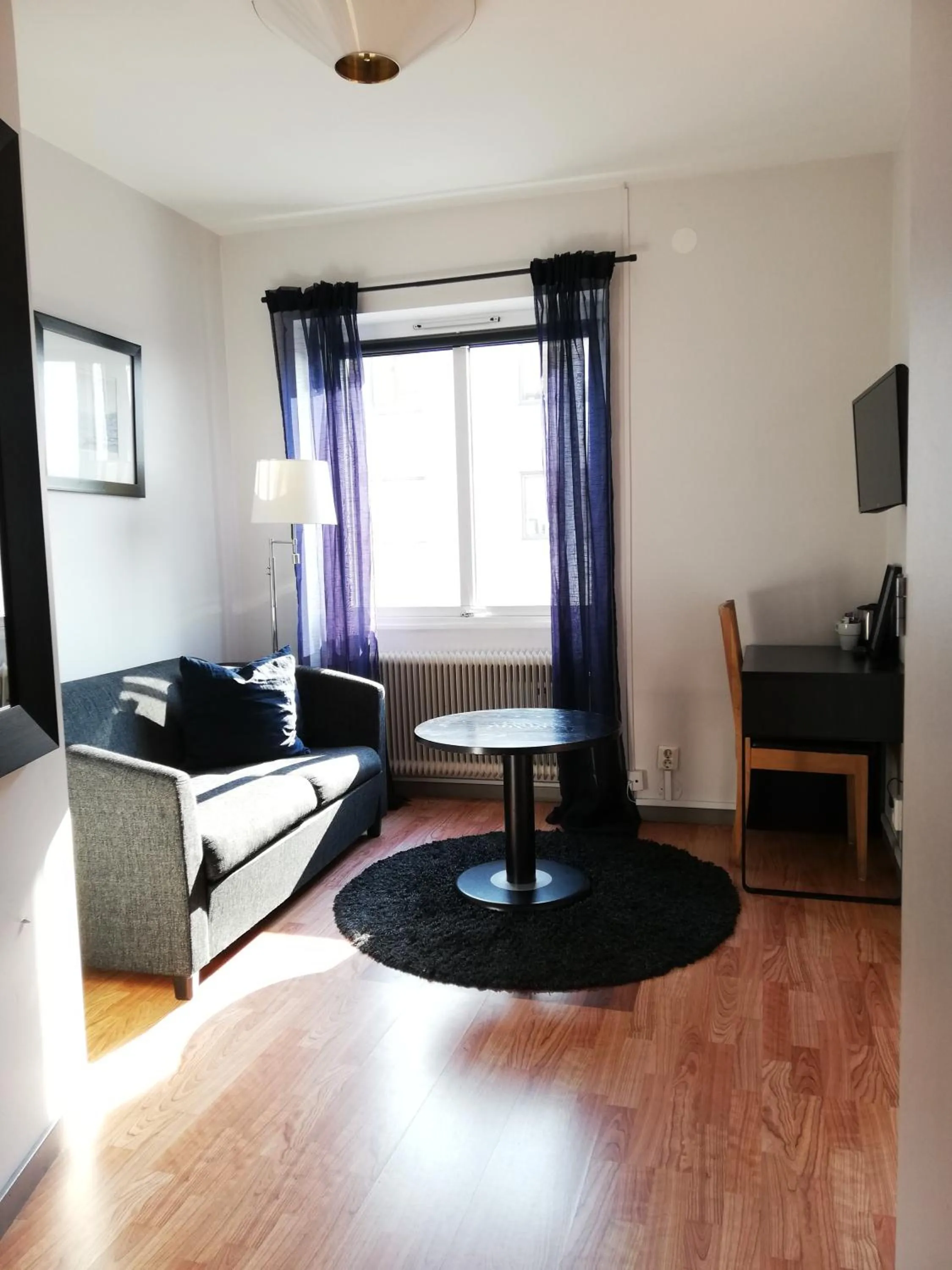 Bed in Strand Hotell