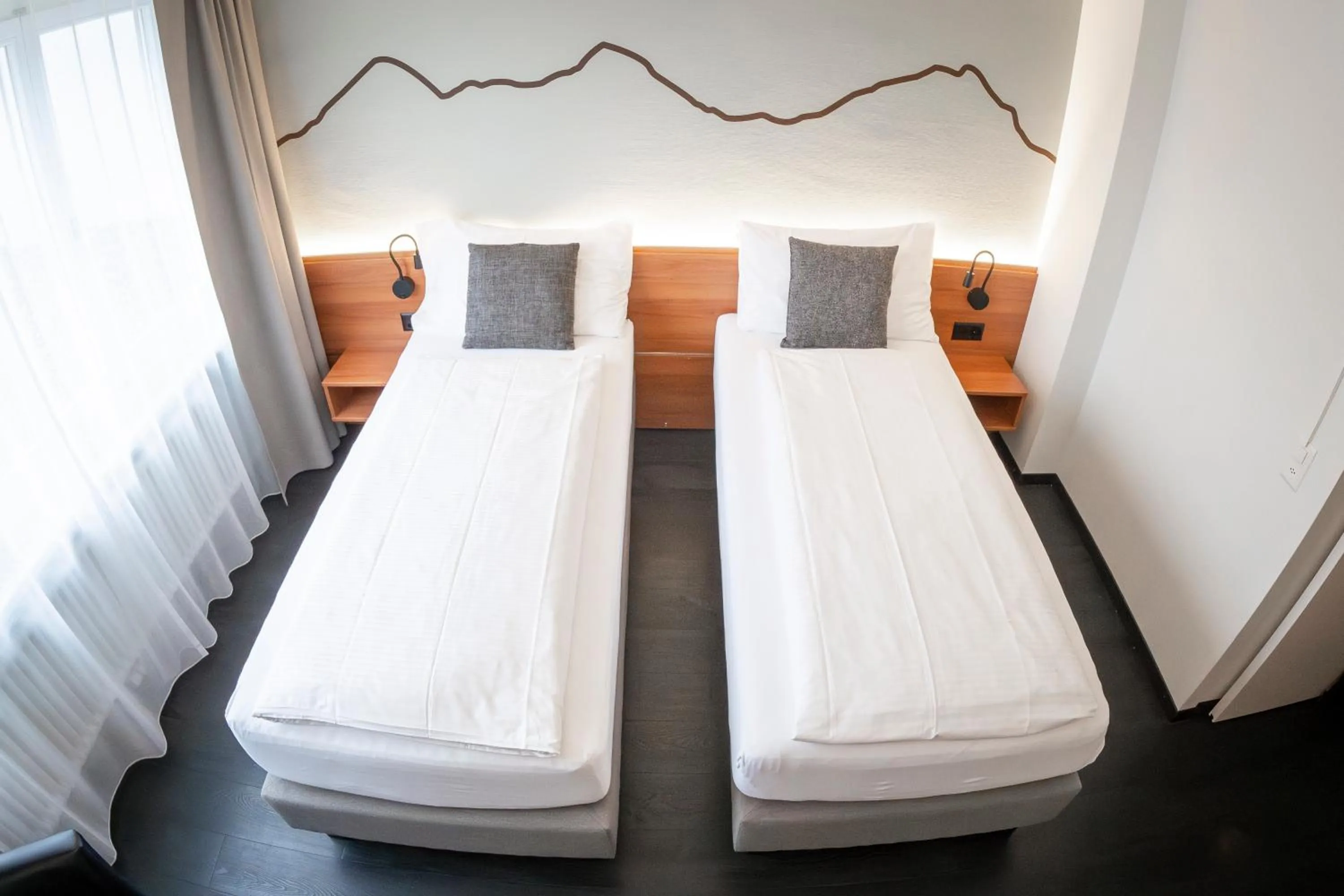 Bed in Hotel Merkur - West Station