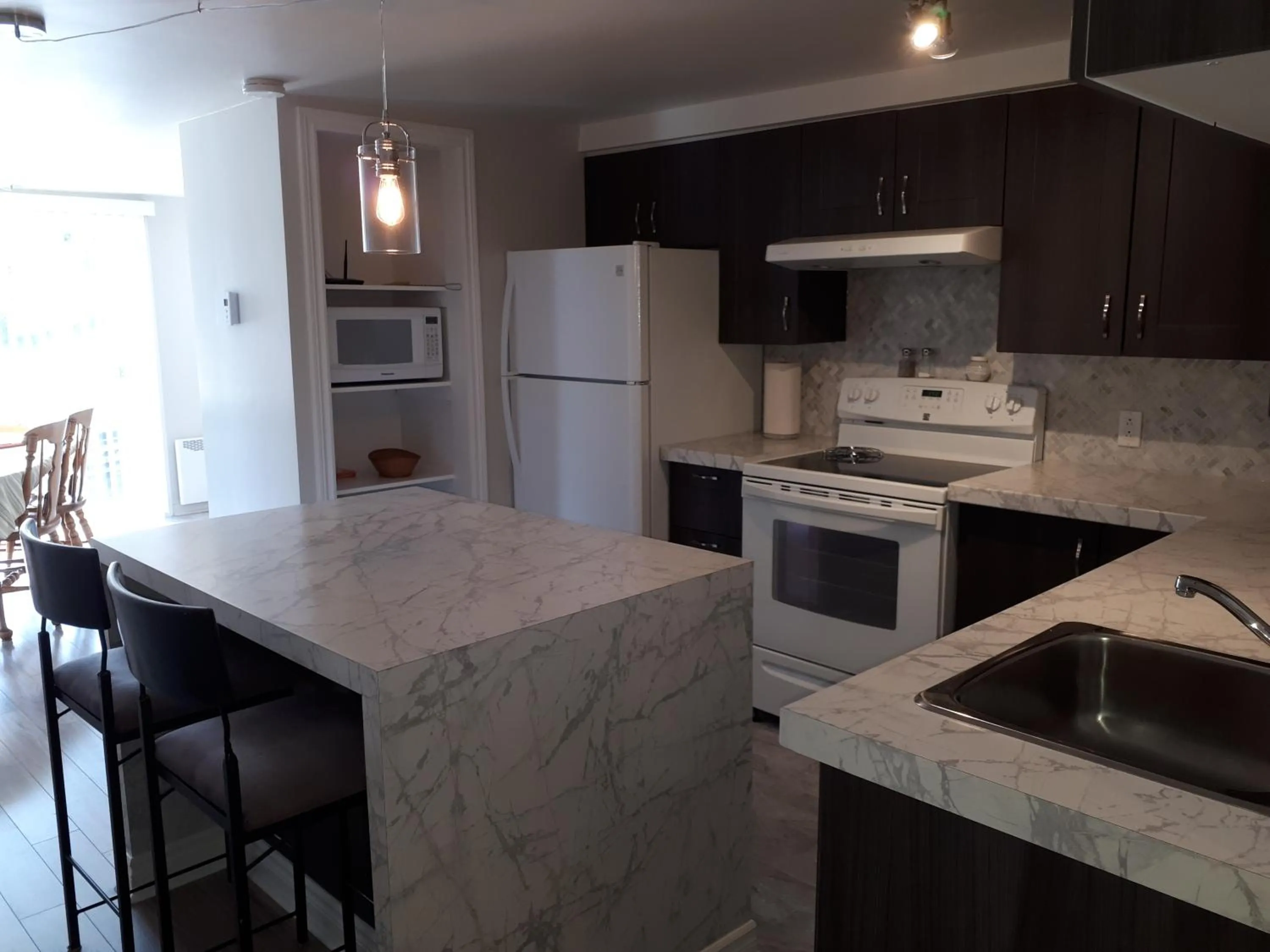 Kitchen or kitchenette in Les Appartements de La Bergeronnette