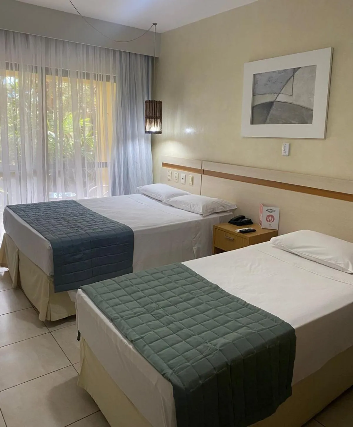 Bed in Catussaba Business Hotel