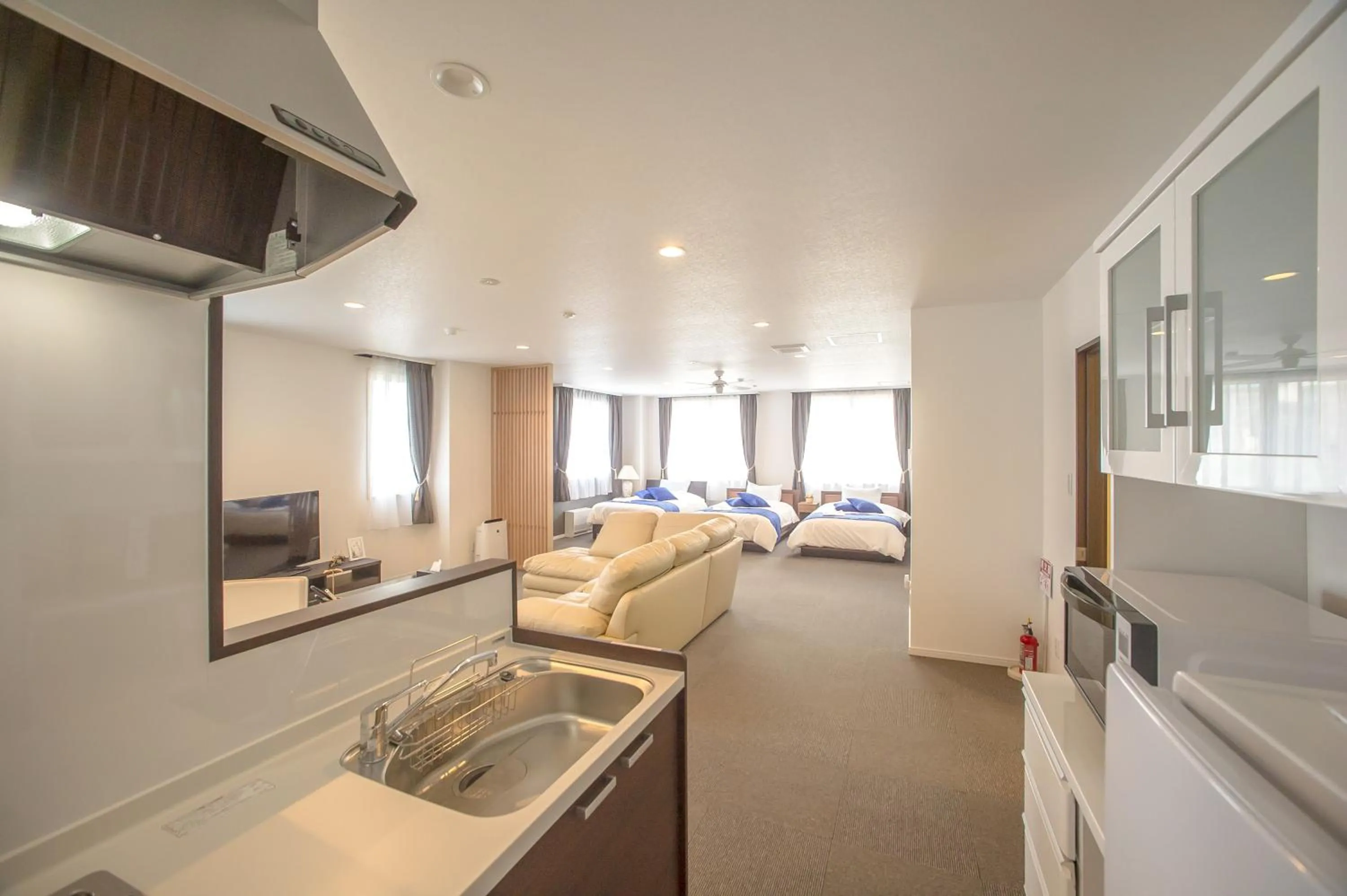 Photo of the whole room, Bed in Condominium Panoramique Motomachi
