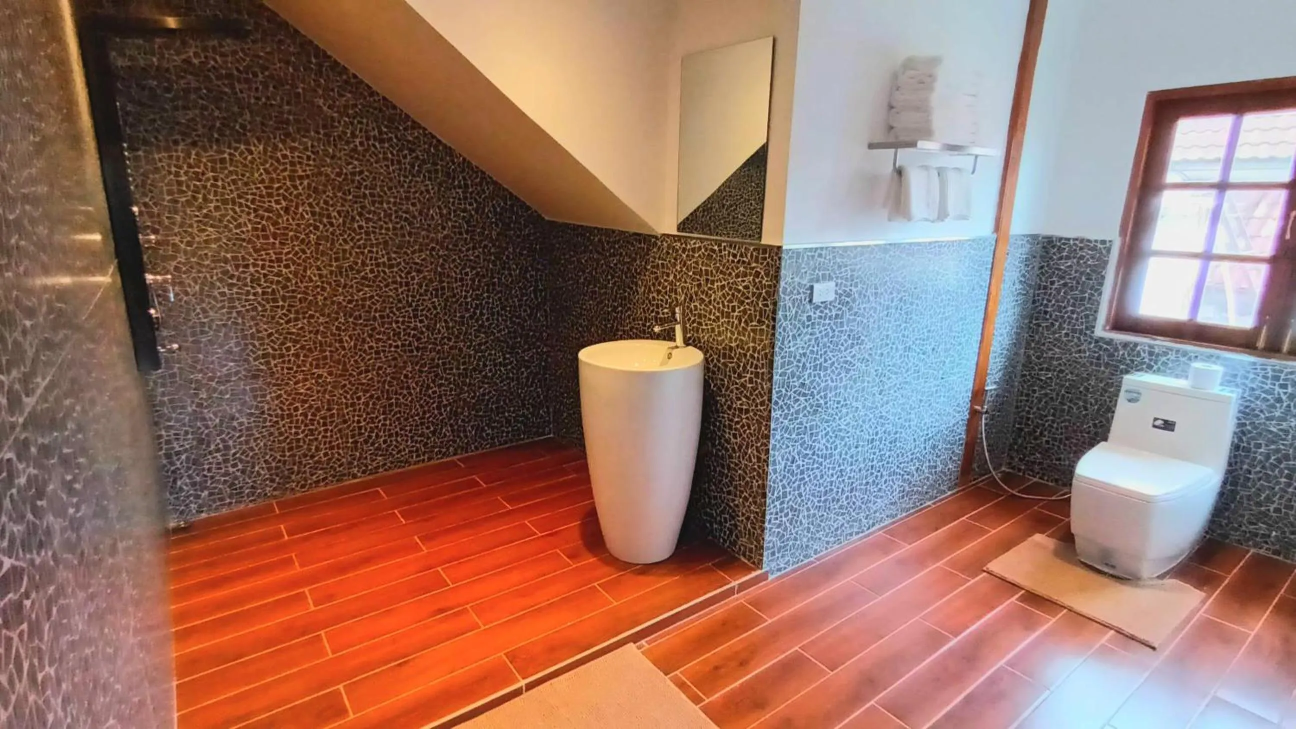 Toilet in Alpha Gay Resort & Spa - Men Only
