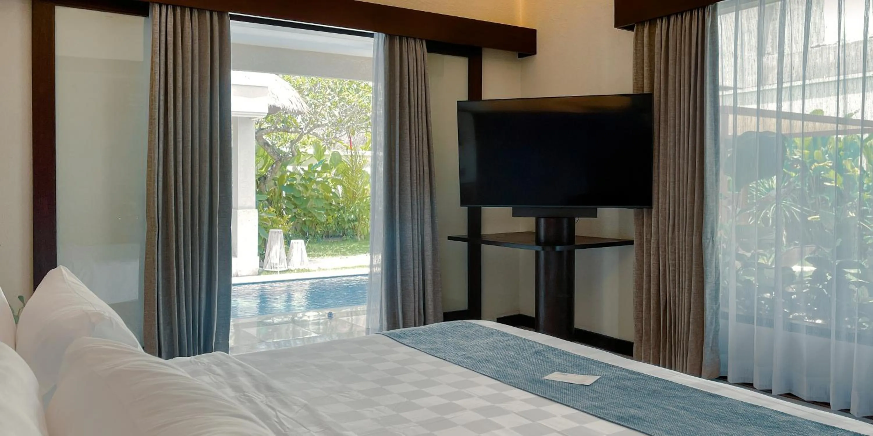 Bed in Aruni Bali Jimbaran Boutique Villa