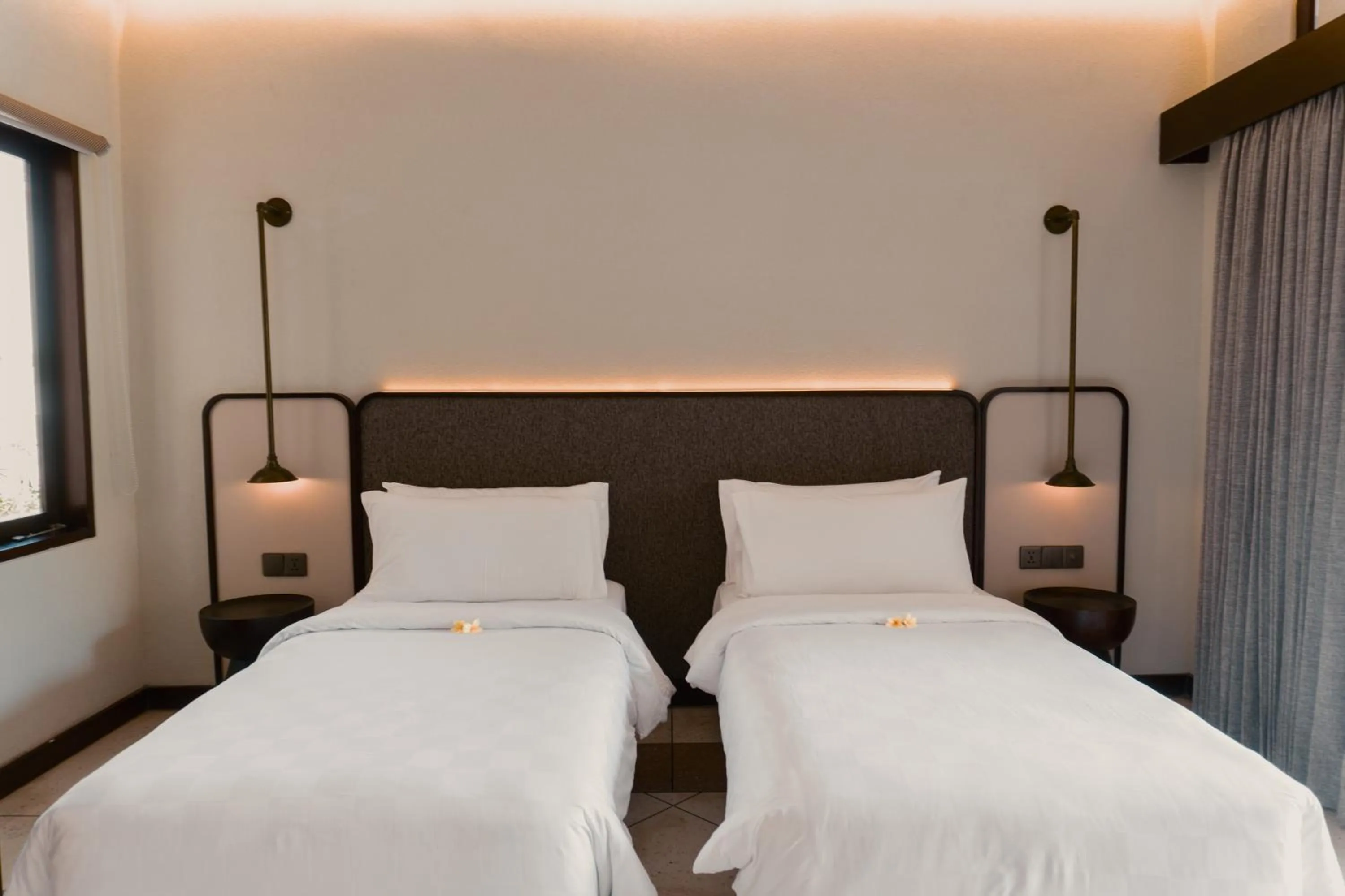 Bed in Aruni Bali Jimbaran Boutique Villa