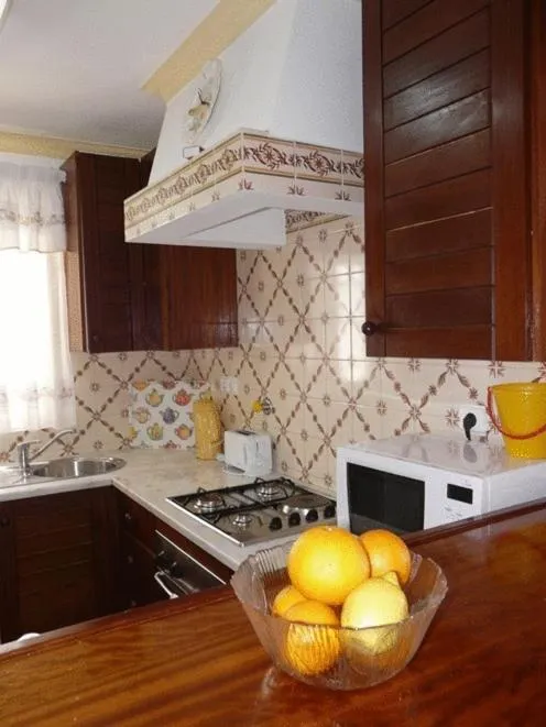 Kitchen or kitchenette in Apartamentos Os Descobrimentos