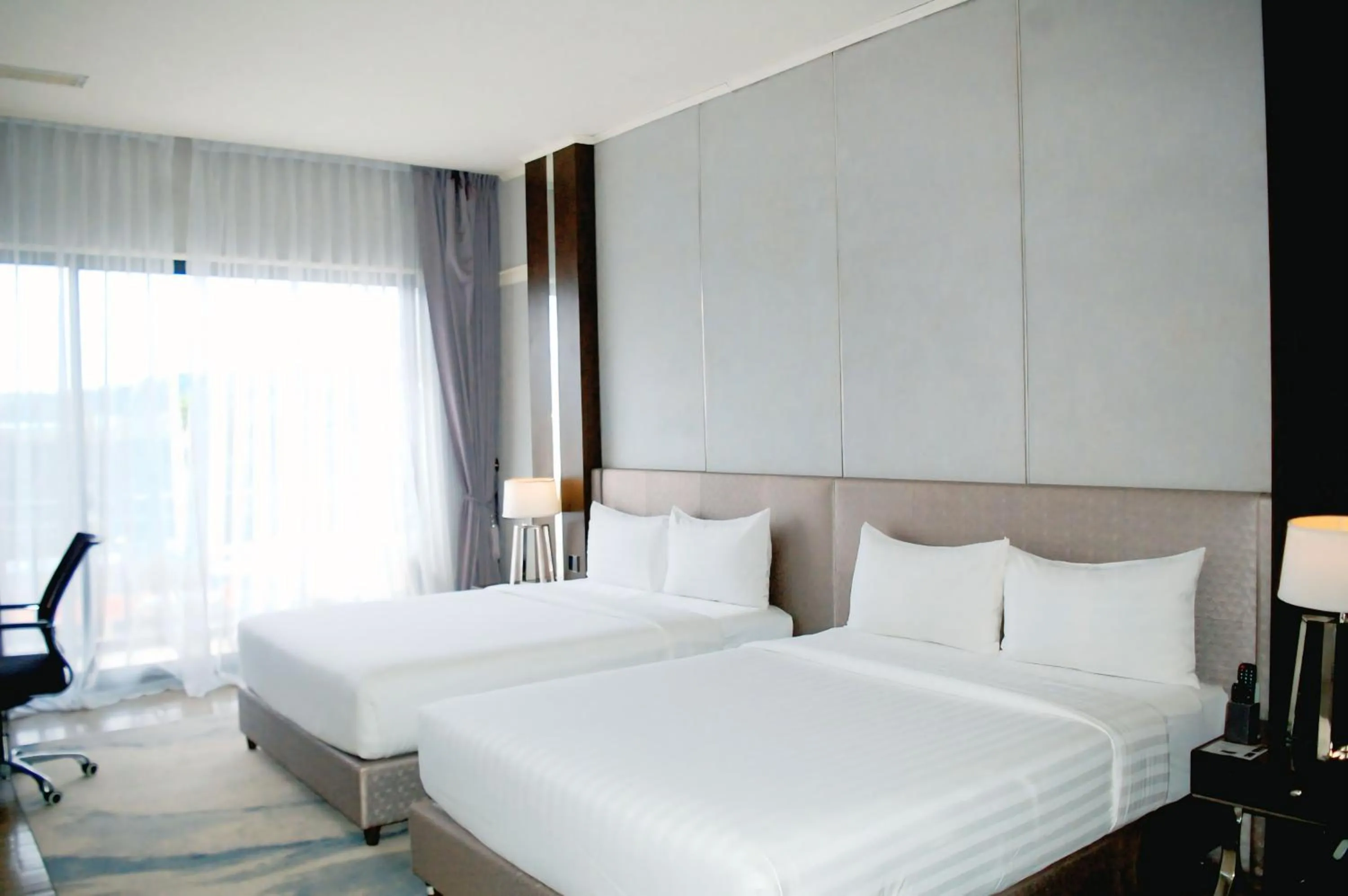 Bed in Le Charmé Suites - Subic