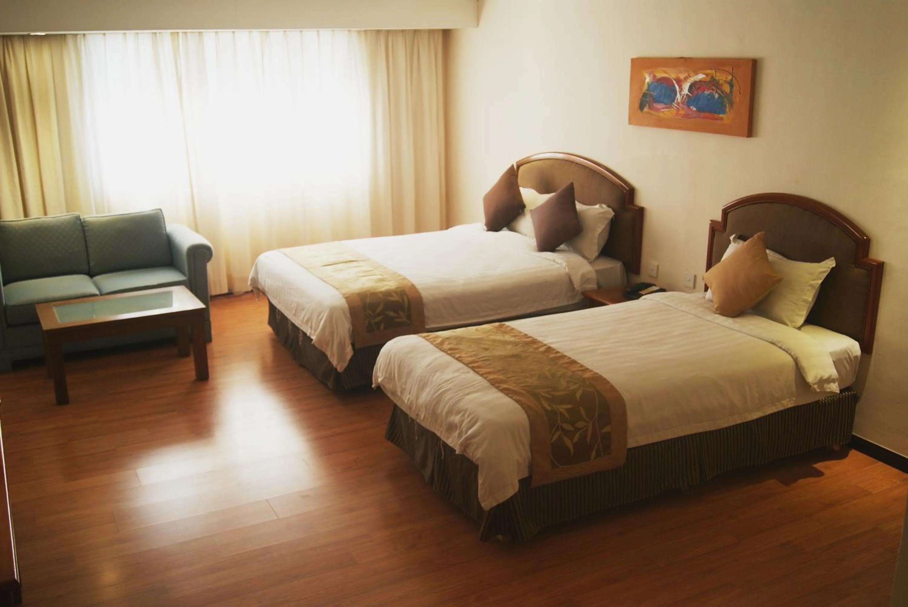 Bed in Kemena Plaza Hotel