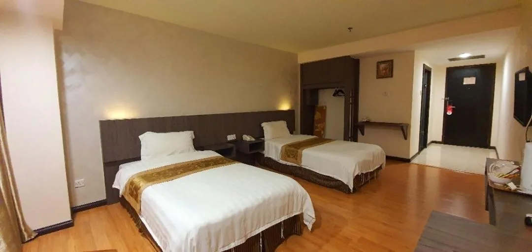 Bed in Kemena Plaza Hotel