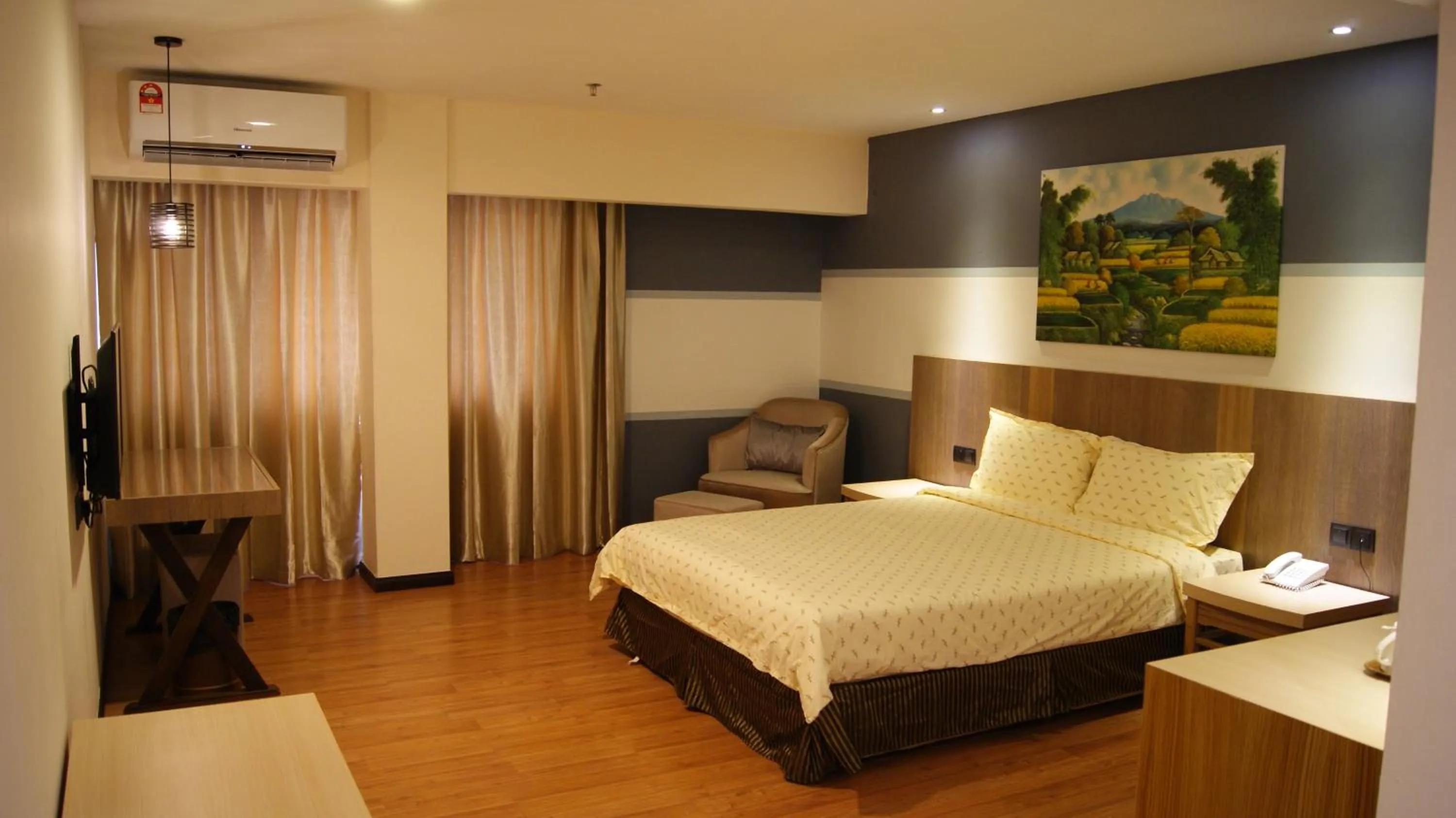 Bed in Kemena Plaza Hotel