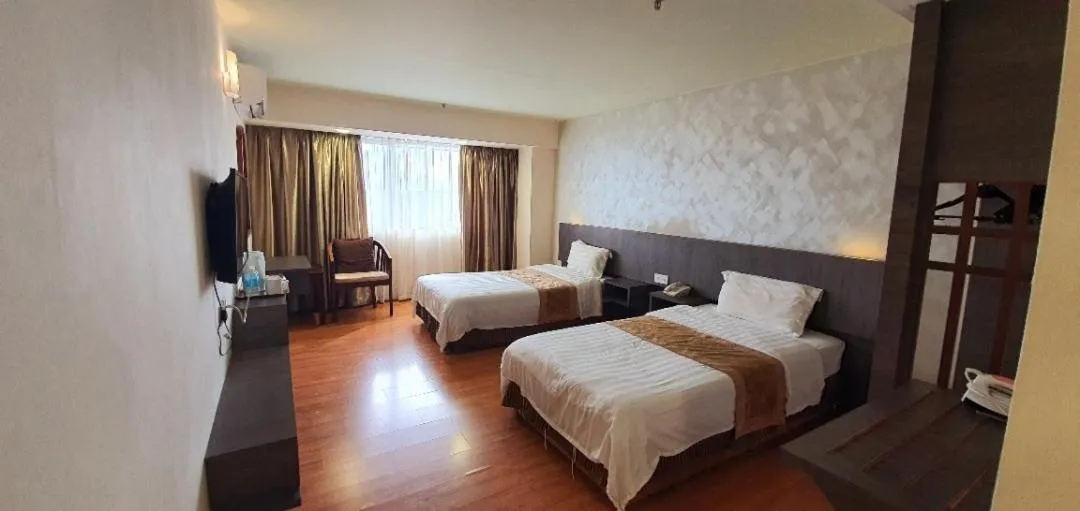 Bed in Kemena Plaza Hotel