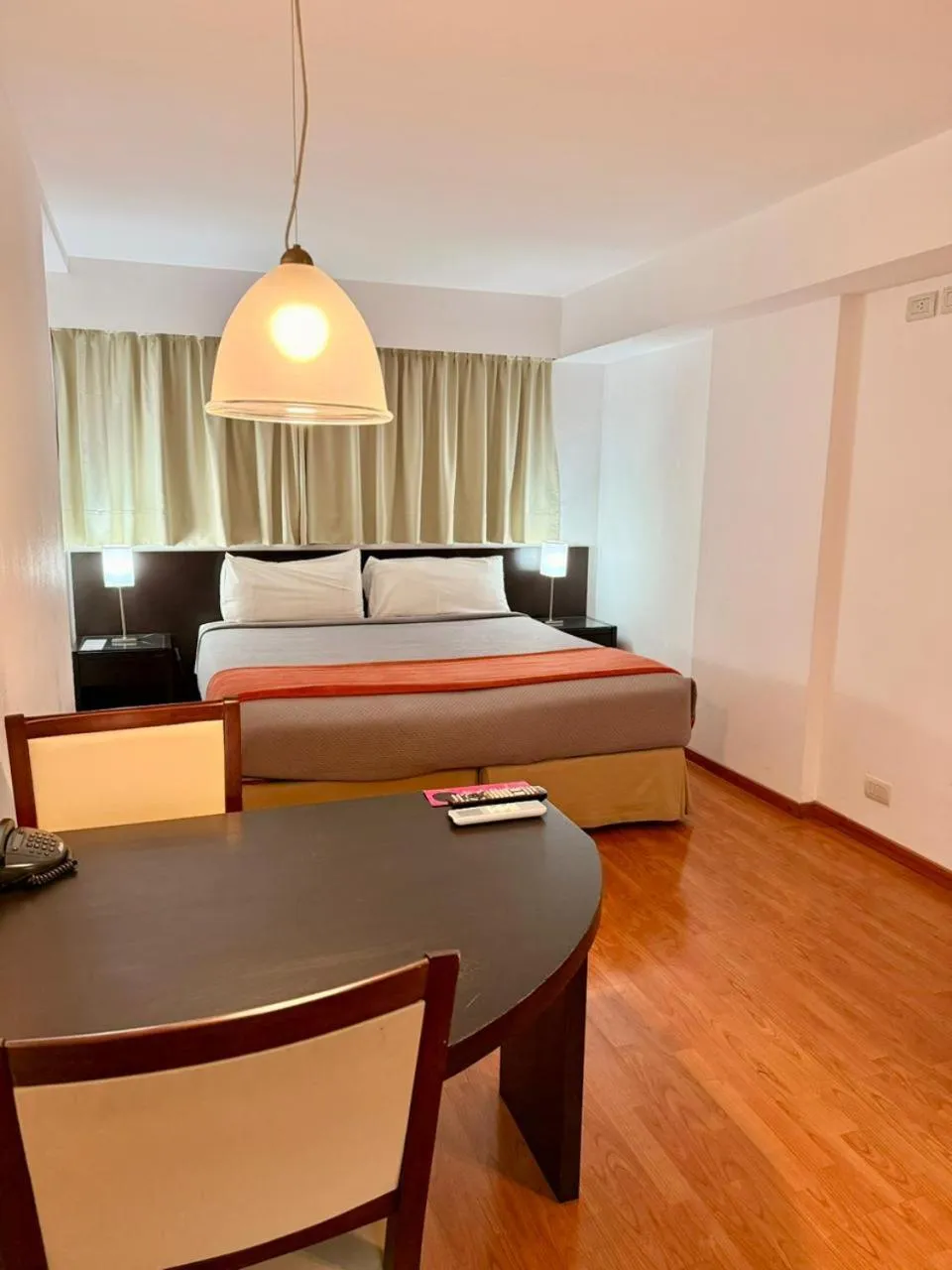 Bed in Urquiza Apart Hotel & Suites
