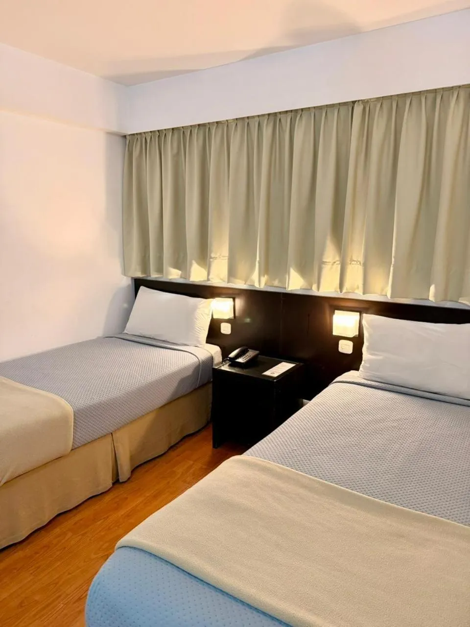 Bed in Urquiza Apart Hotel & Suites