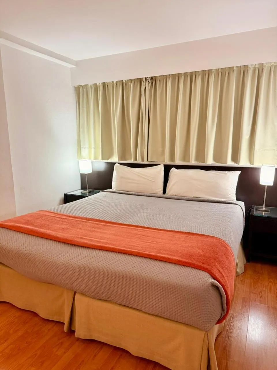 Bed in Urquiza Apart Hotel & Suites