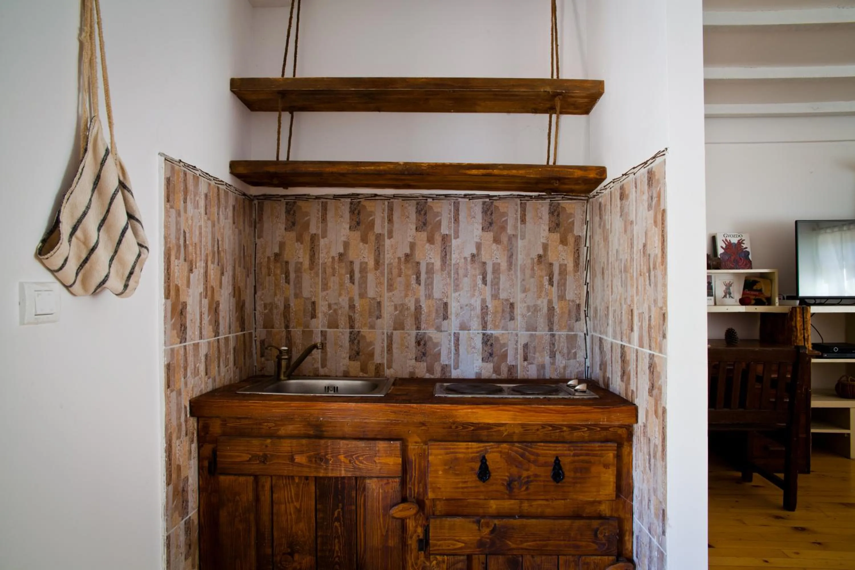 Kitchen or kitchenette in Dembelija Rooms