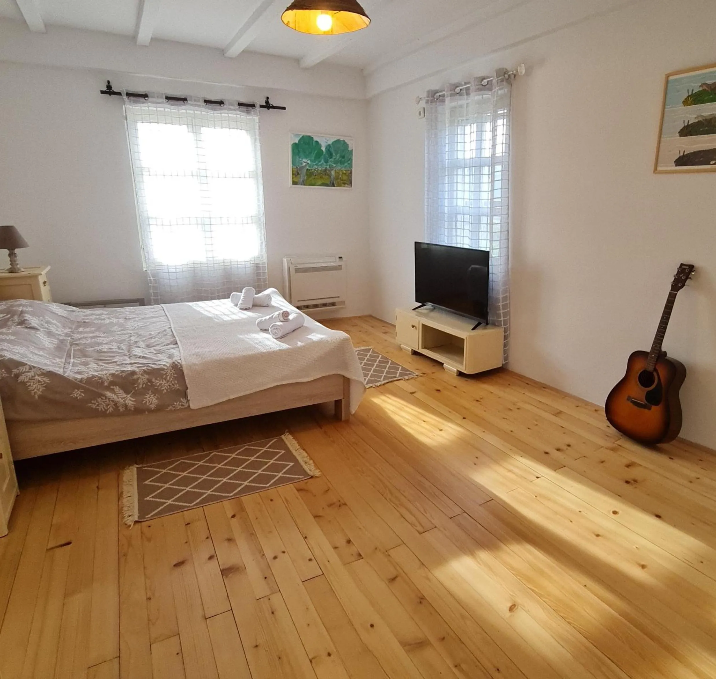 Bed in Dembelija Rooms