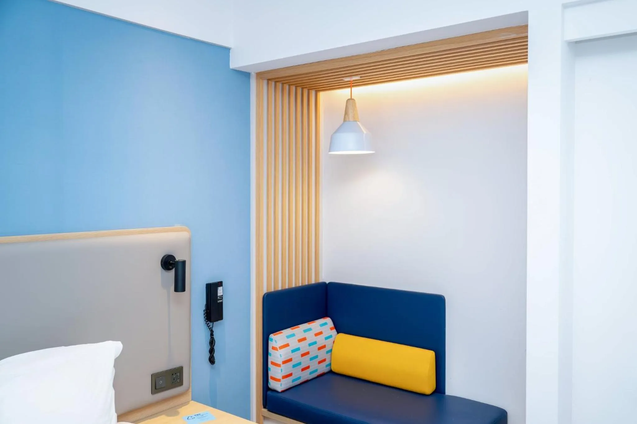 Photo of the whole room, Bed in Holiday Inn Express Shanghai Pudong Airport by IHG