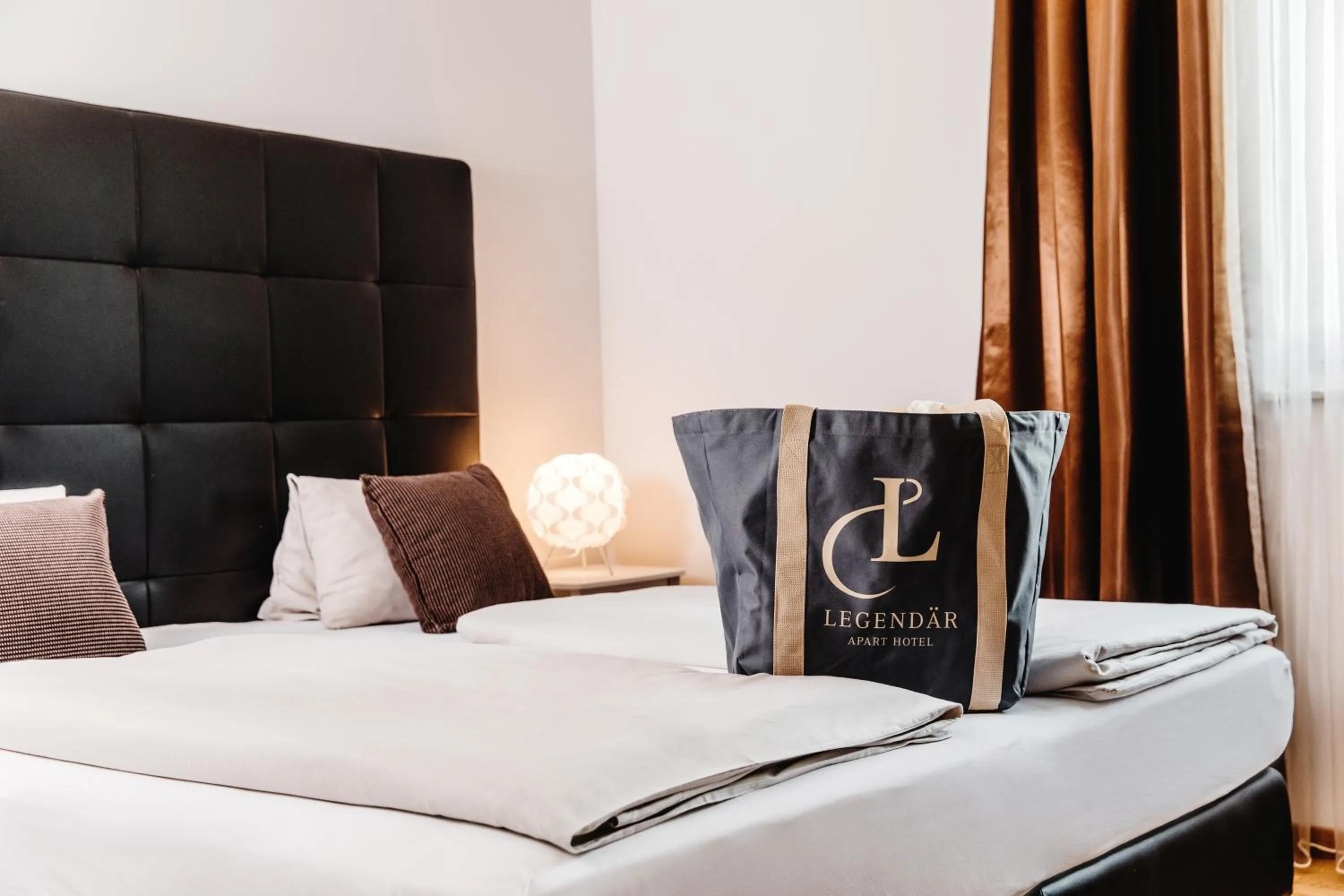 Bed in Apart Hotel Legendär