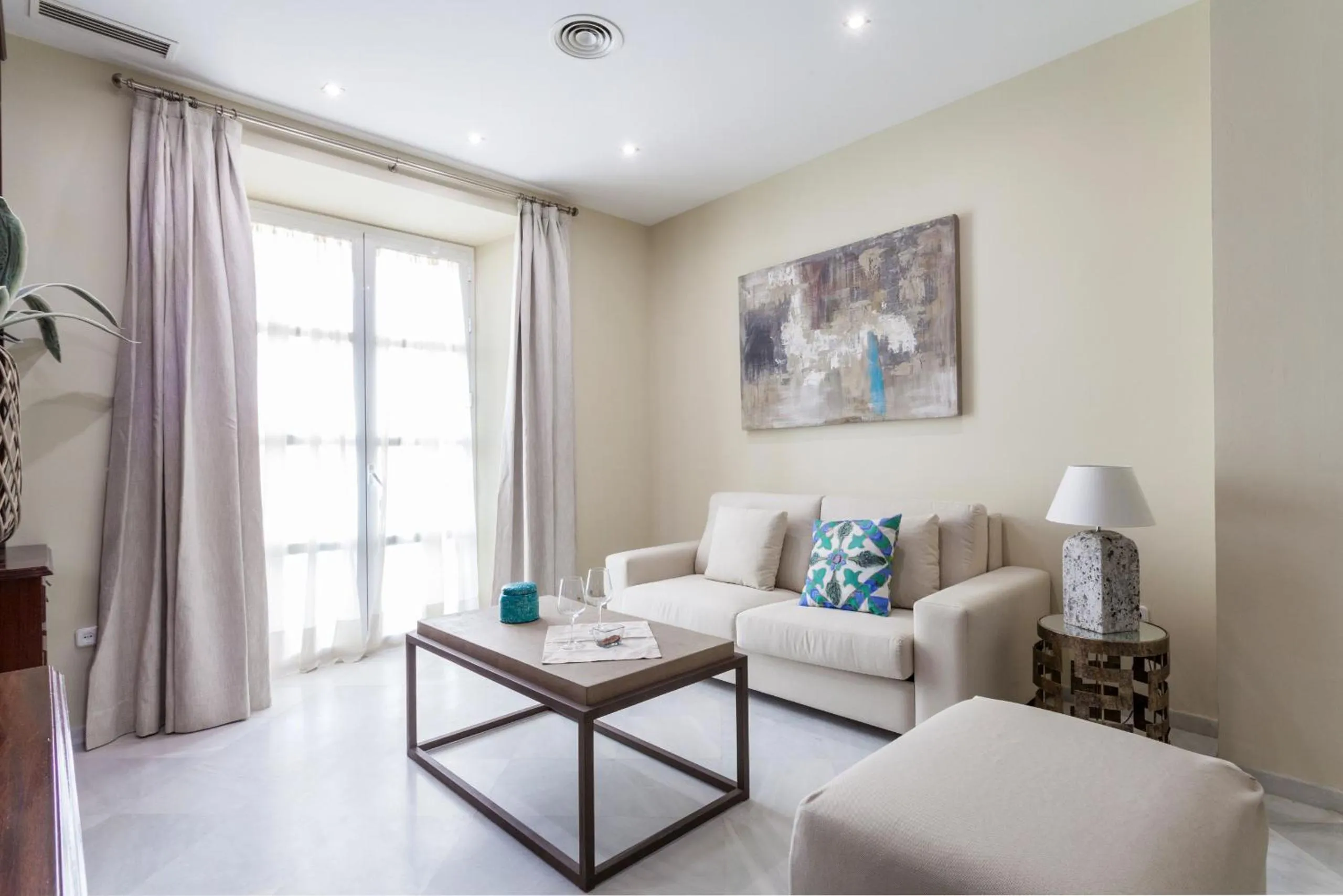 Communal lounge/ TV room in Green-Apartments Sierpes