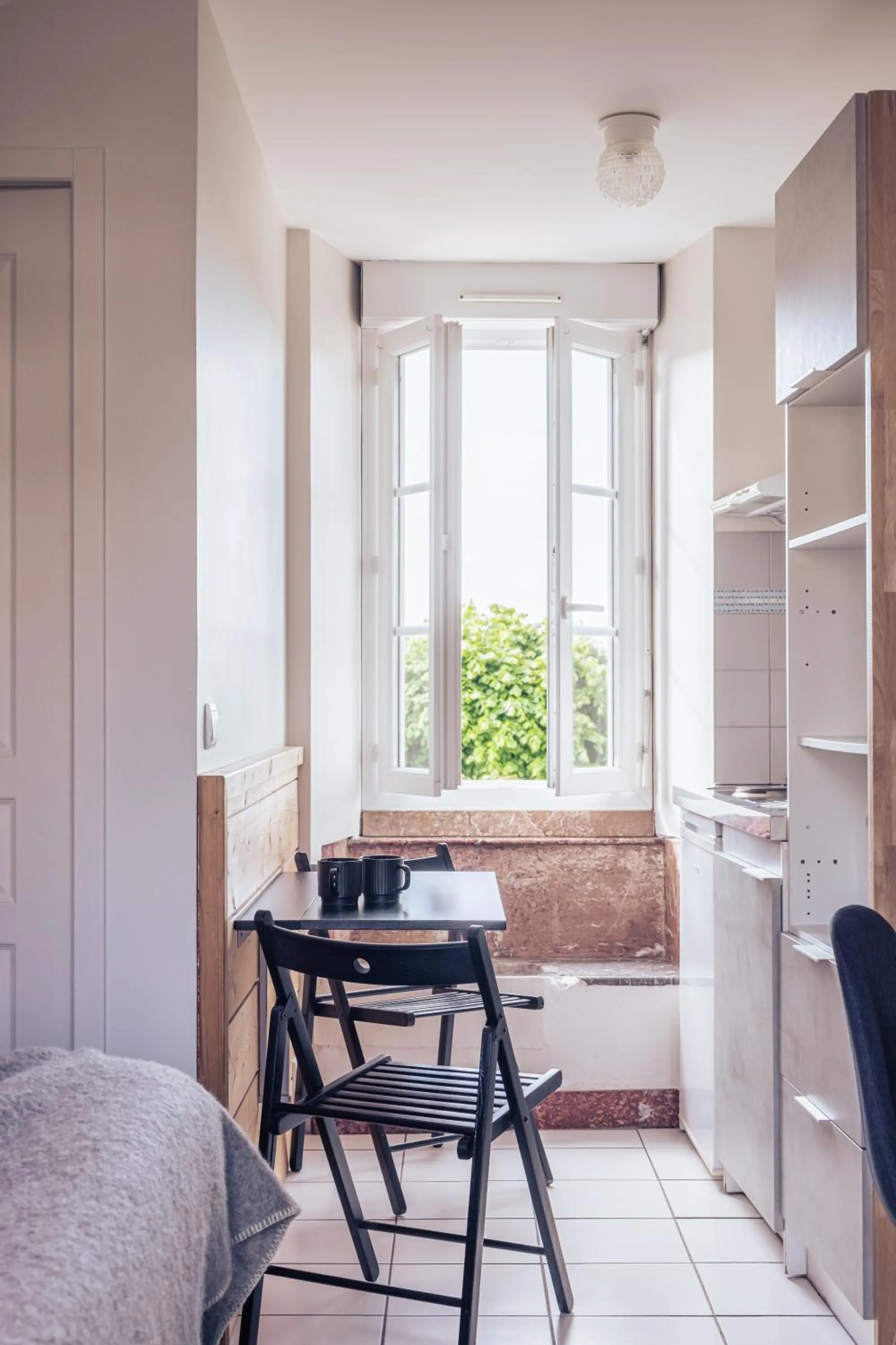 Kitchen or kitchenette in Le Clos du 5 - Appart Hotel Bagneres