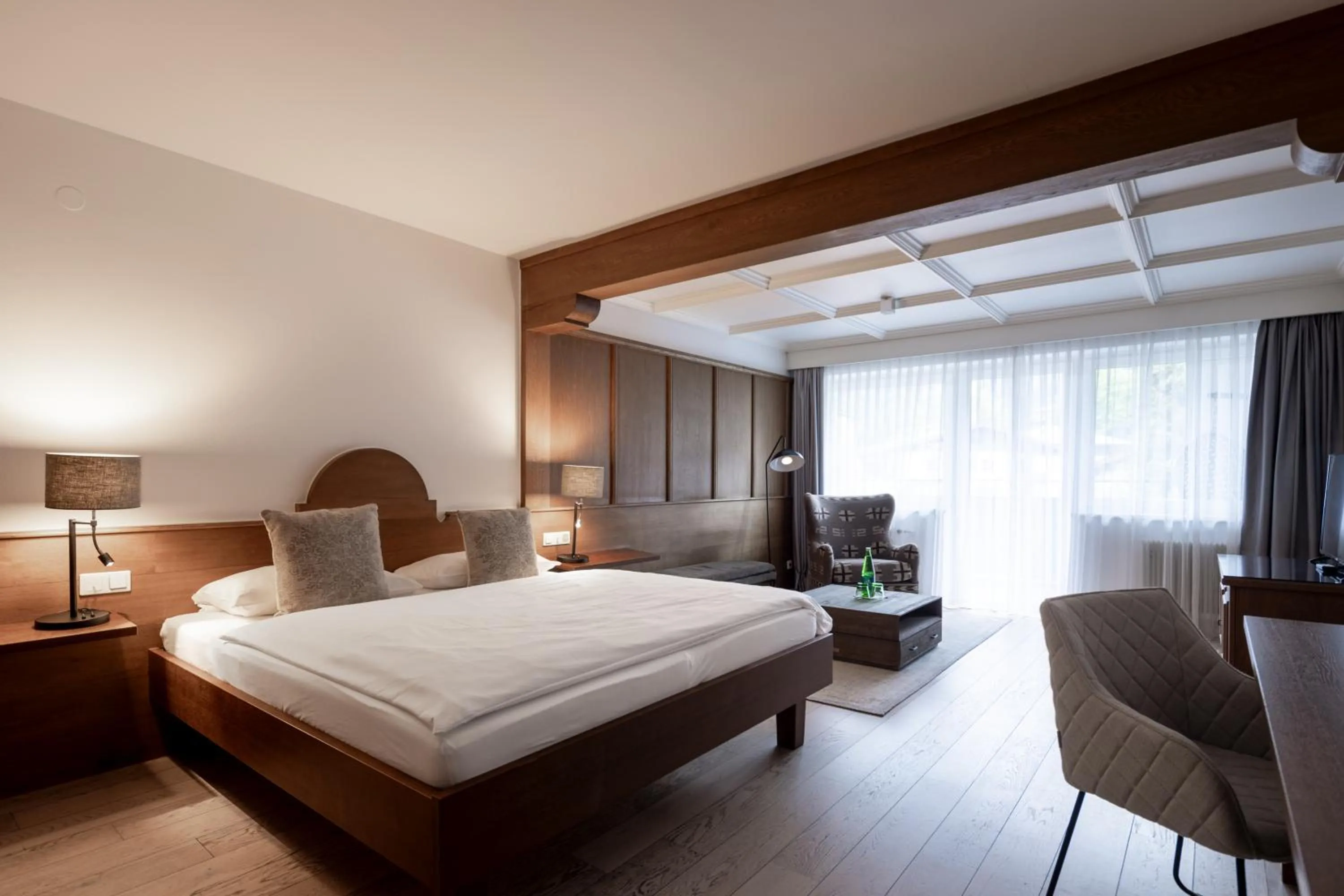 Living room, Bed in Q! Hotel Maria Theresia