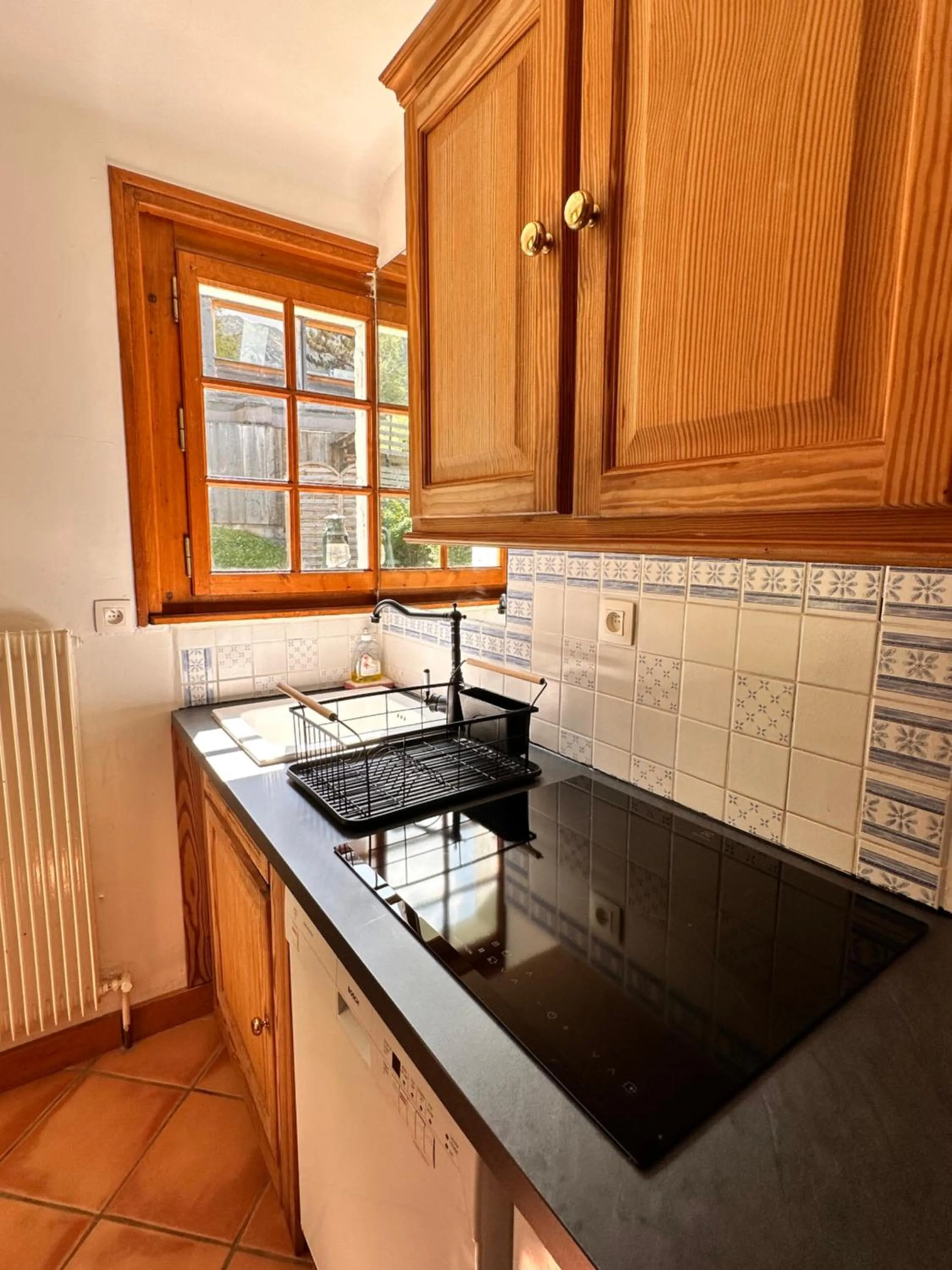Kitchen or kitchenette in Hôtel Le Jeu de Paume