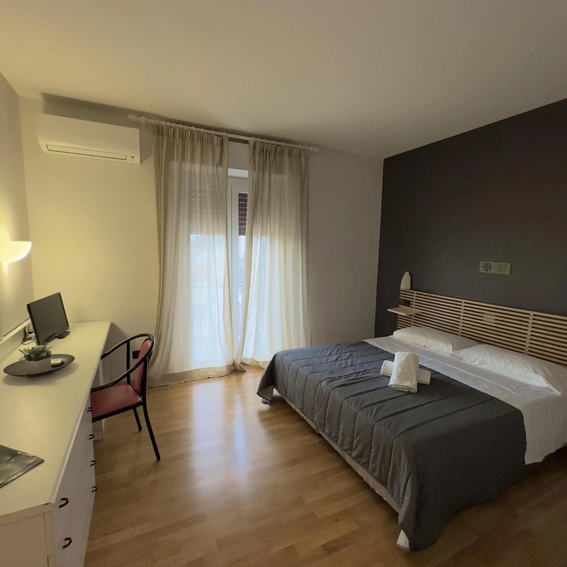 Bed in Hotel Quadrifoglio