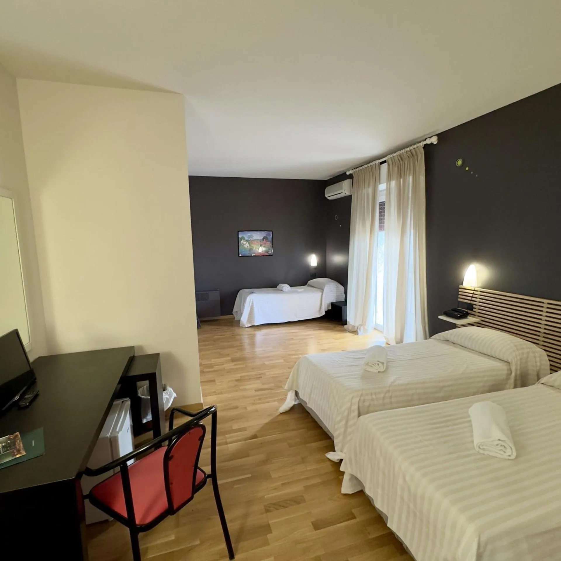 Bed in Hotel Quadrifoglio