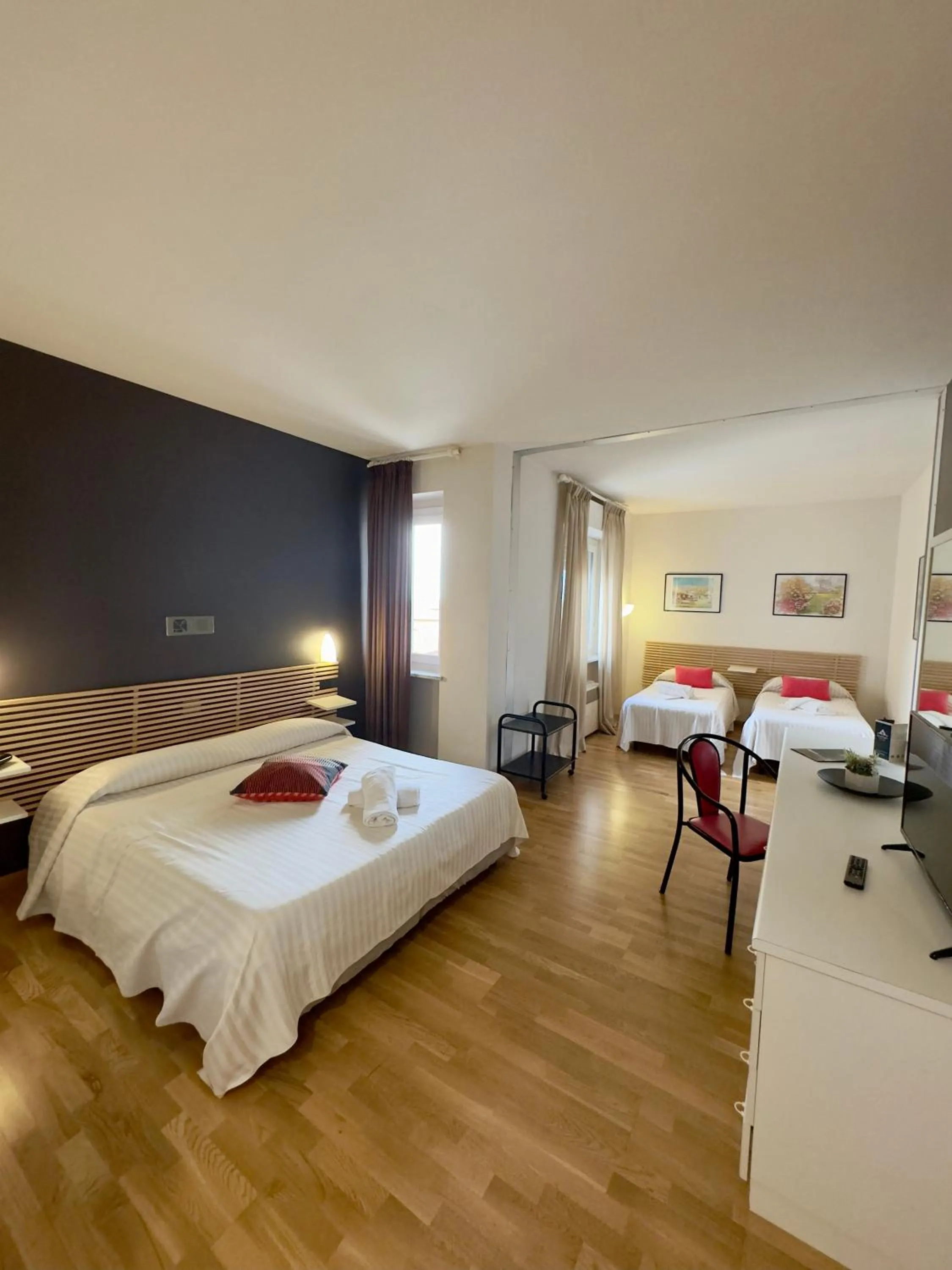 Bed in Hotel Quadrifoglio