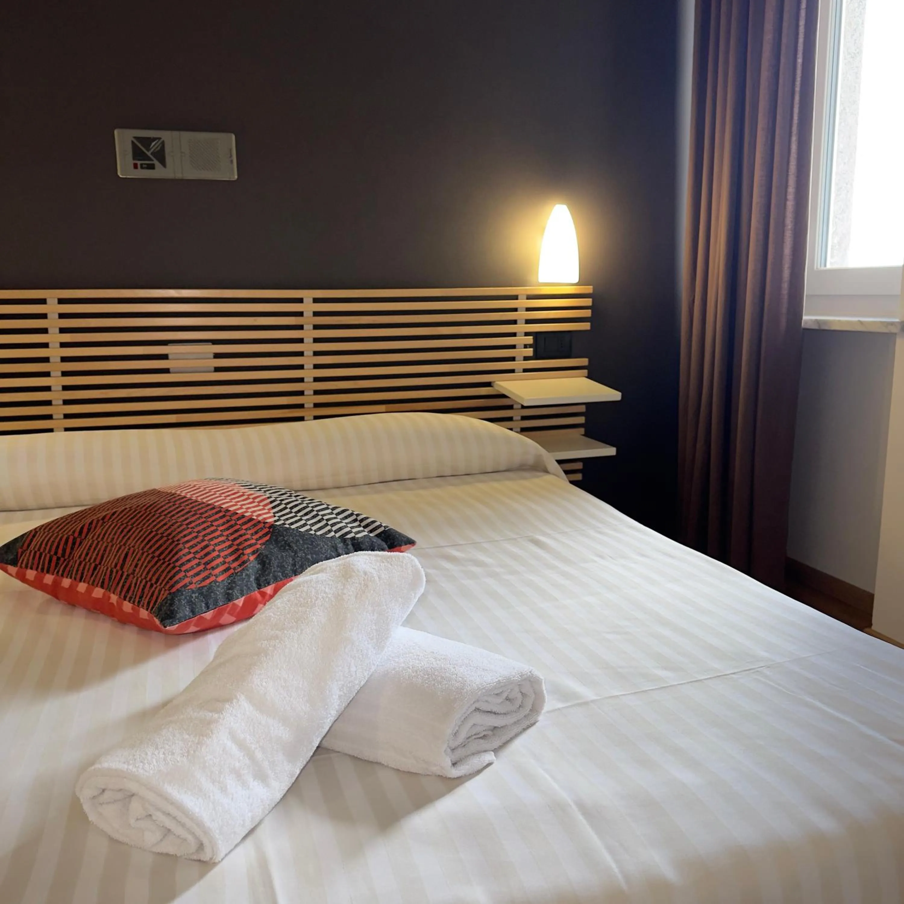 Bed in Hotel Quadrifoglio