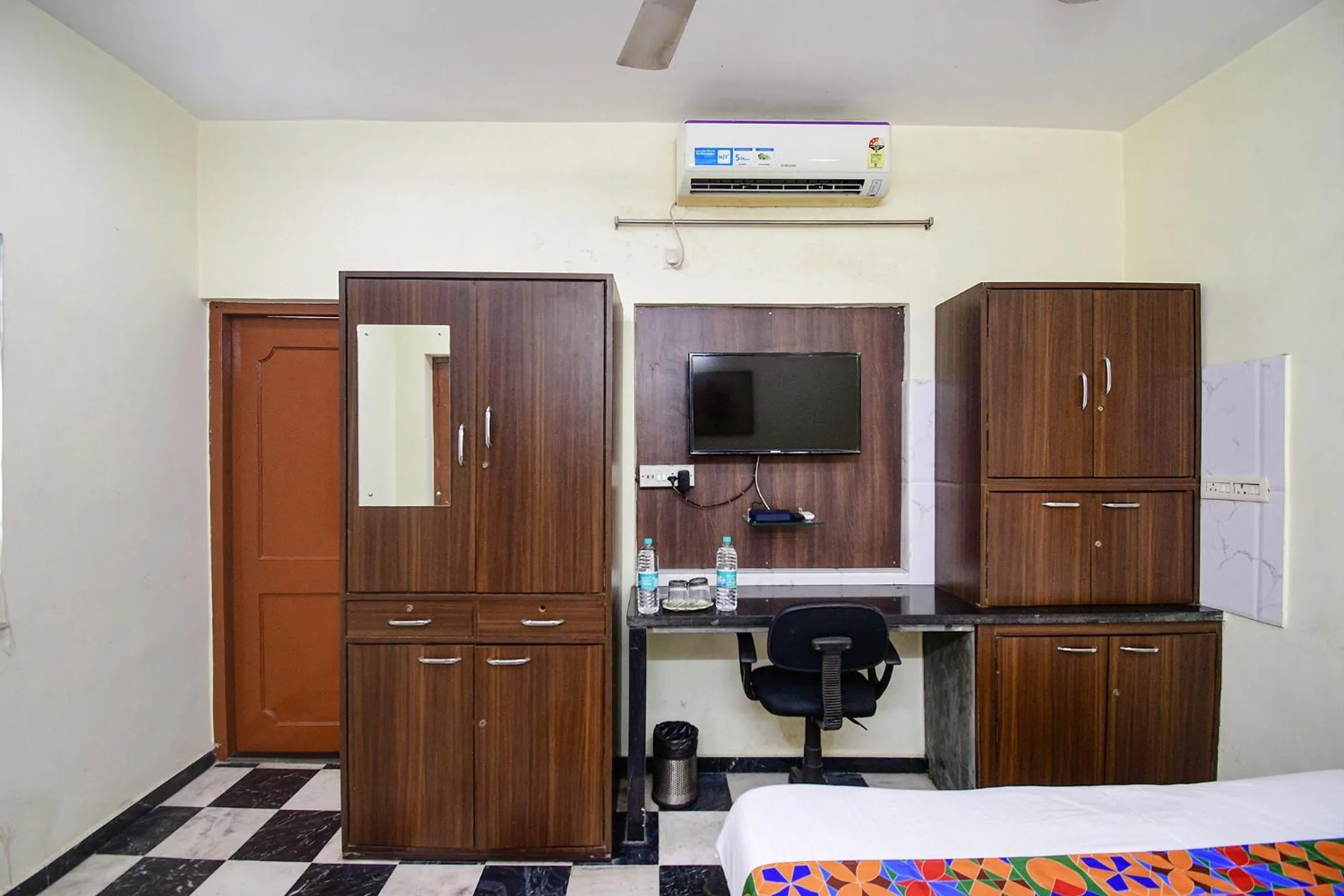 Bed in FabExpress Ullash Residency