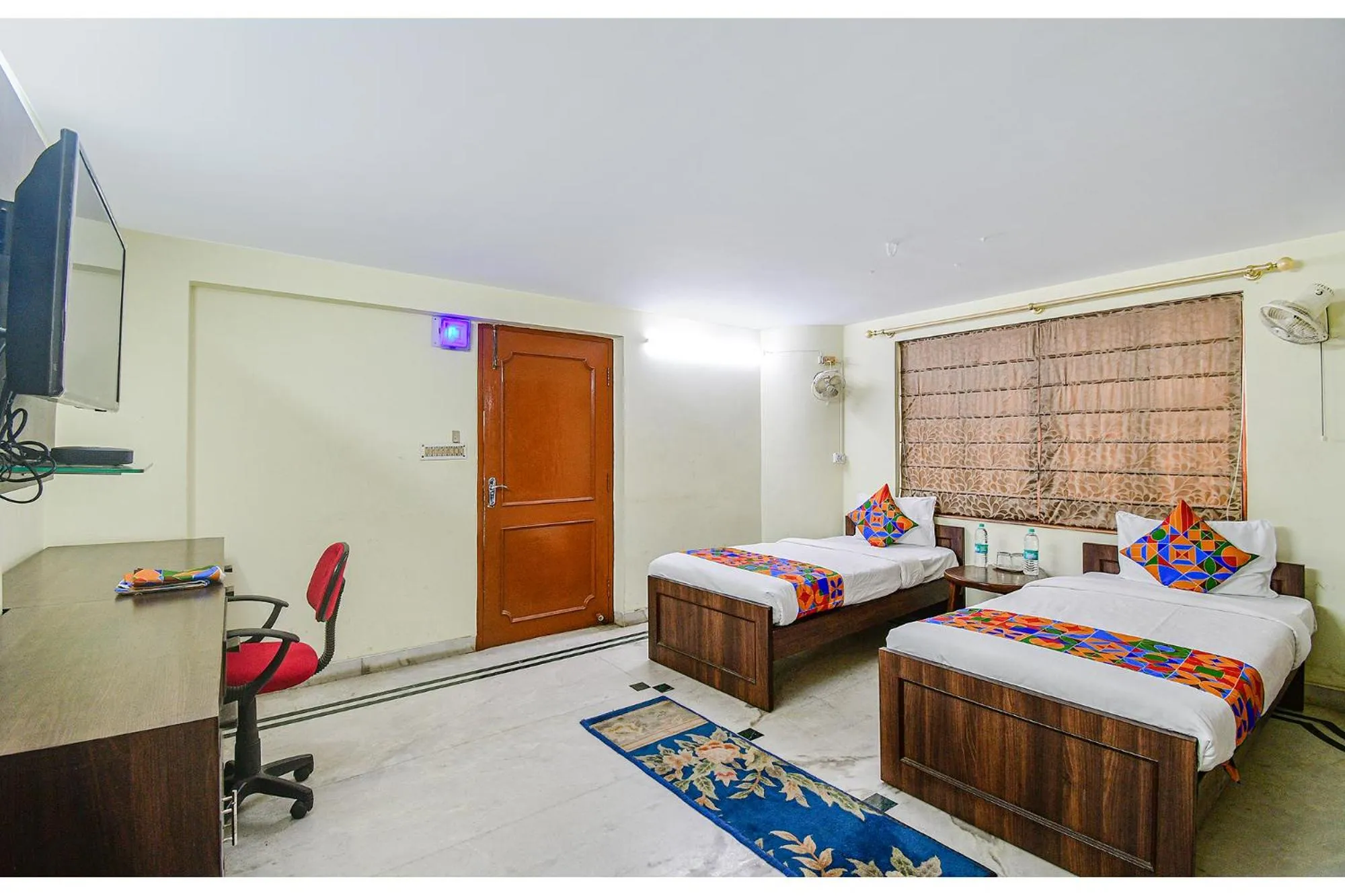 Bed in FabExpress Ullash Residency