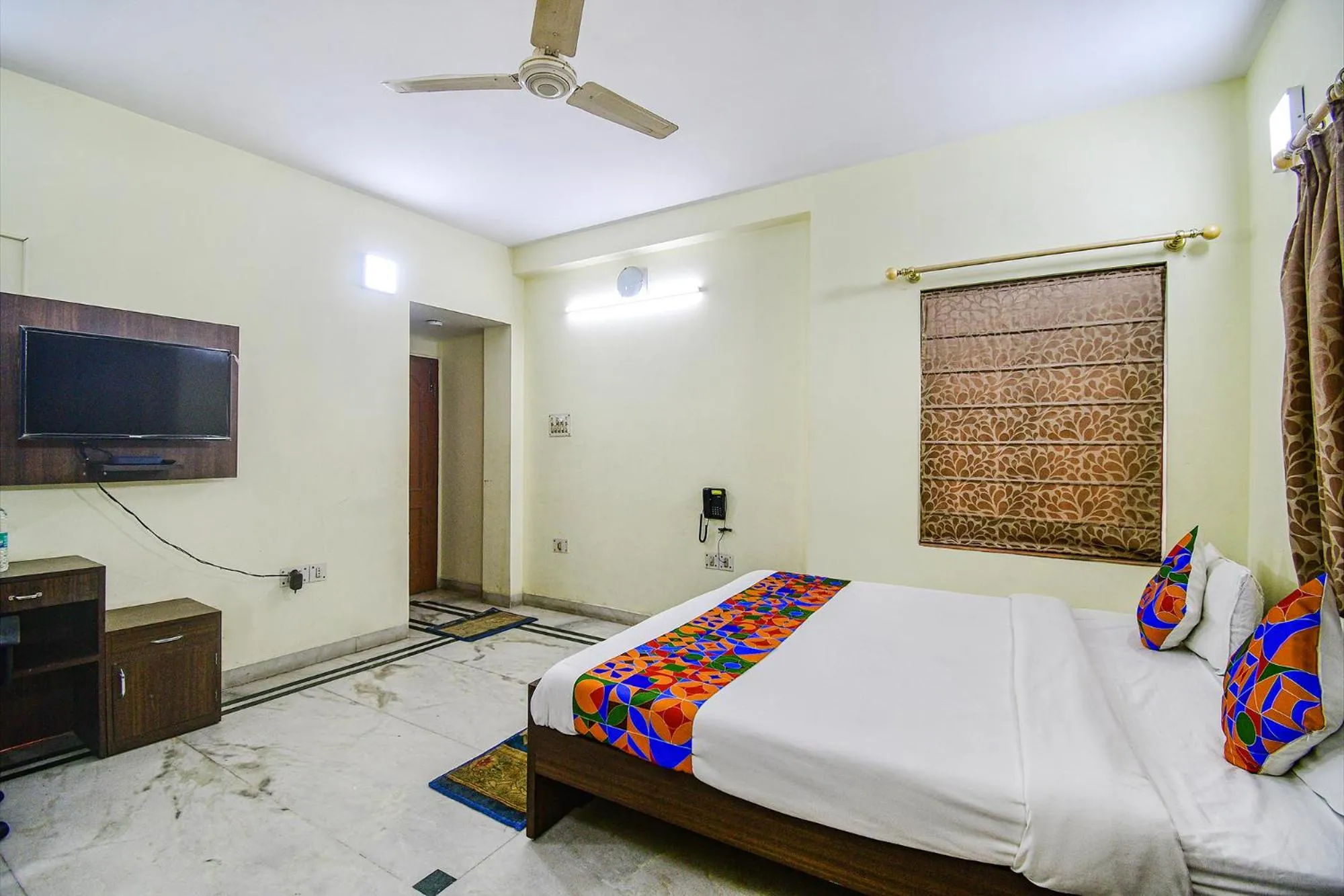 Bed in FabExpress Ullash Residency