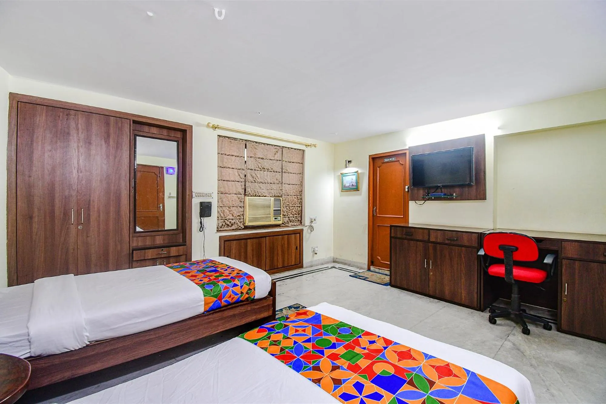 Bed in FabExpress Ullash Residency