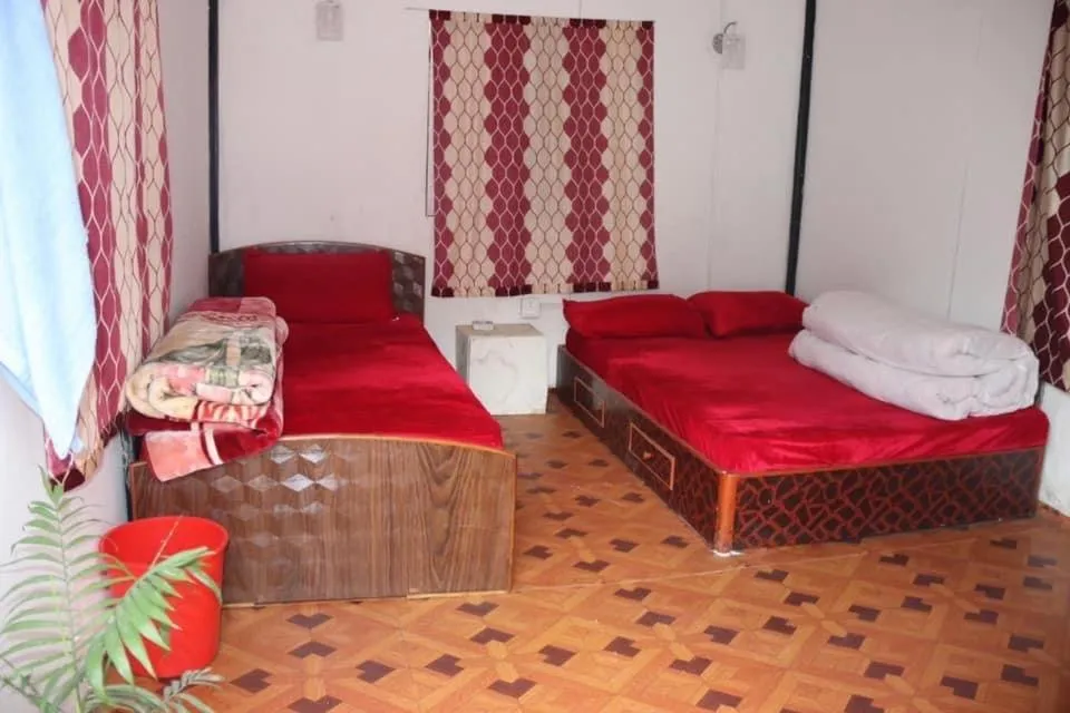 Bed in Nagarkot Trekkers Inn