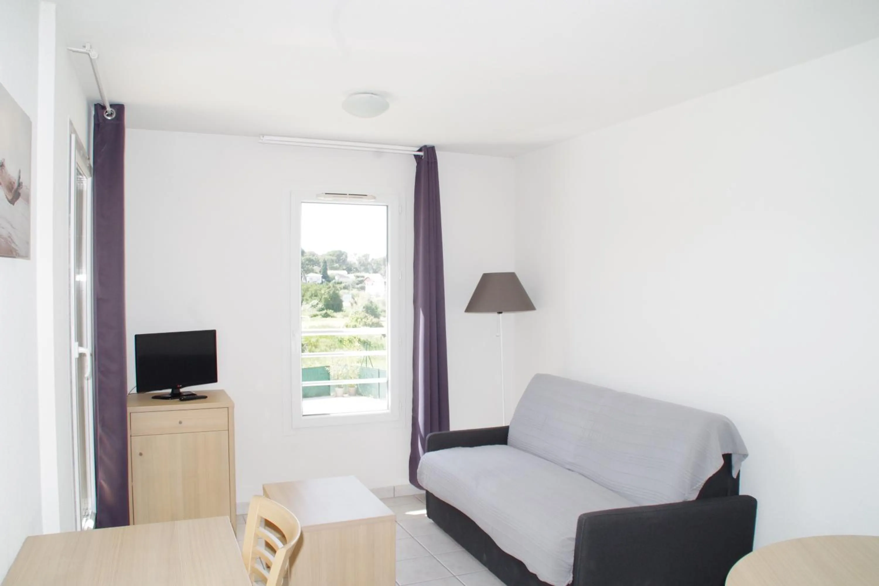 Seating area in La Résidence Des Oliviers