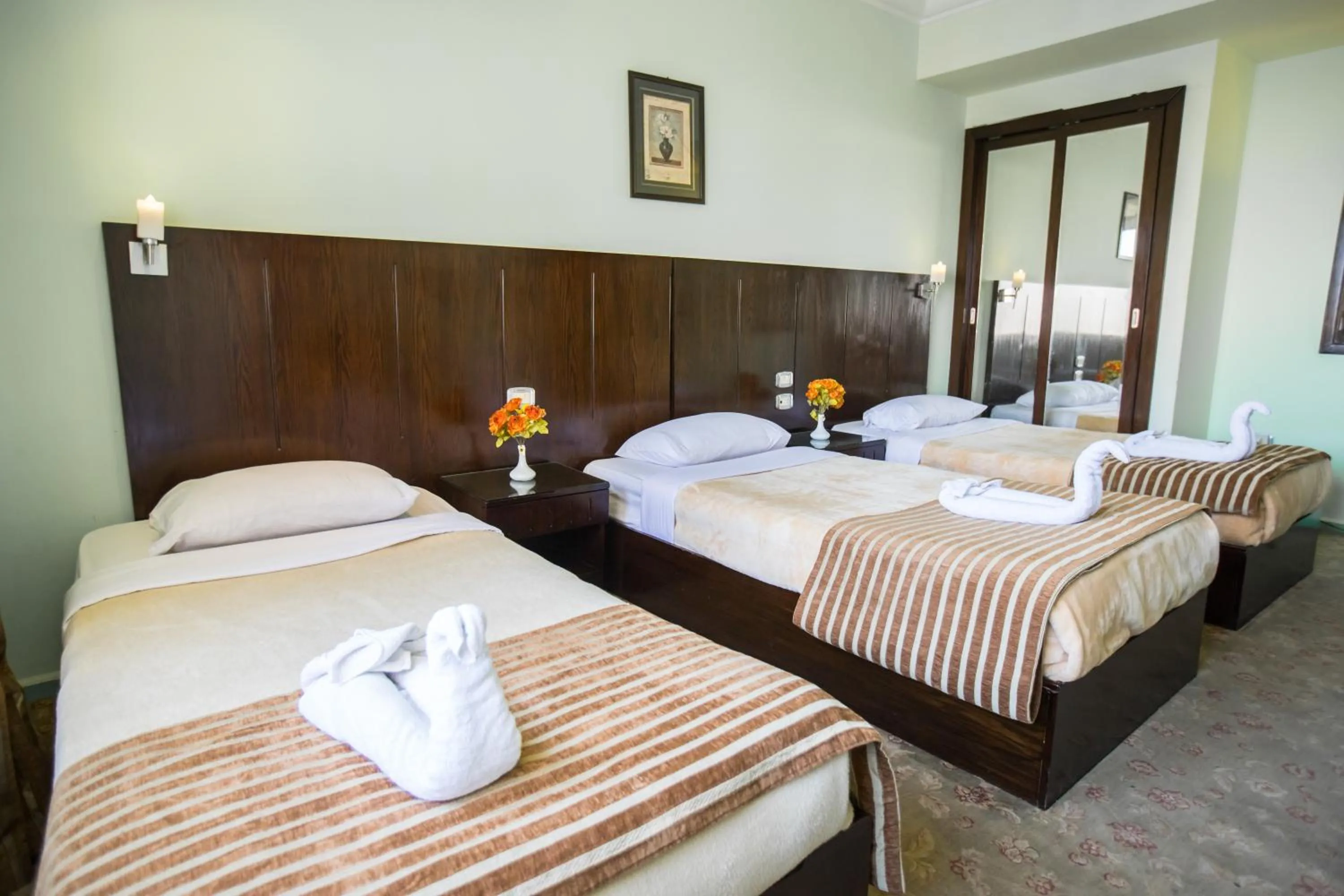 Bed in Aura Inn Hotel Cairo