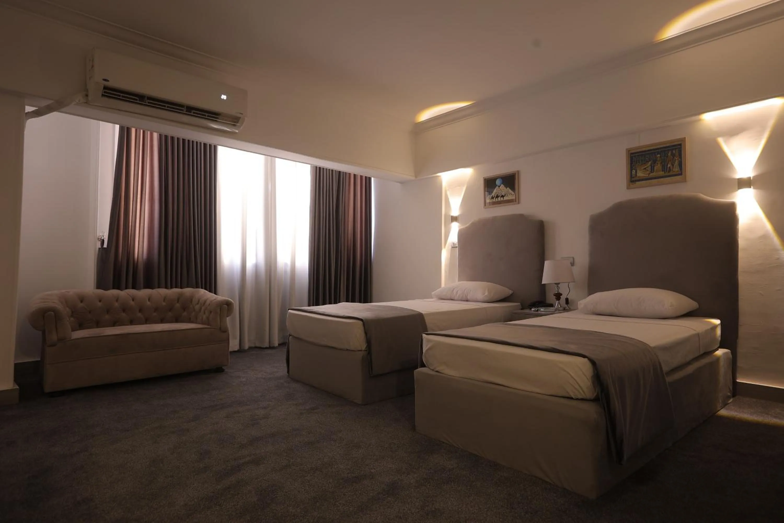 Photo of the whole room, Bed in Aura Inn Hotel Cairo