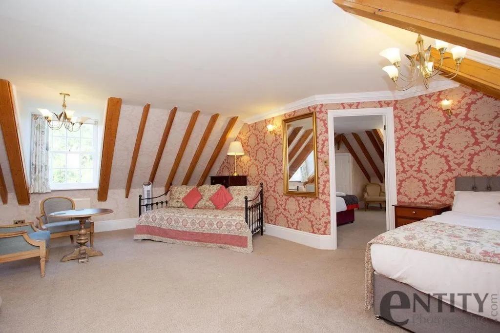 Seating area, Bed in Woodlands Lodge Hotel