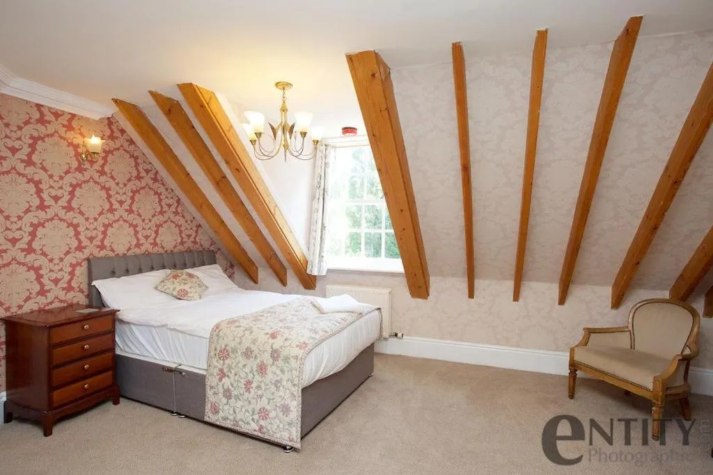 Bed in Woodlands Lodge Hotel