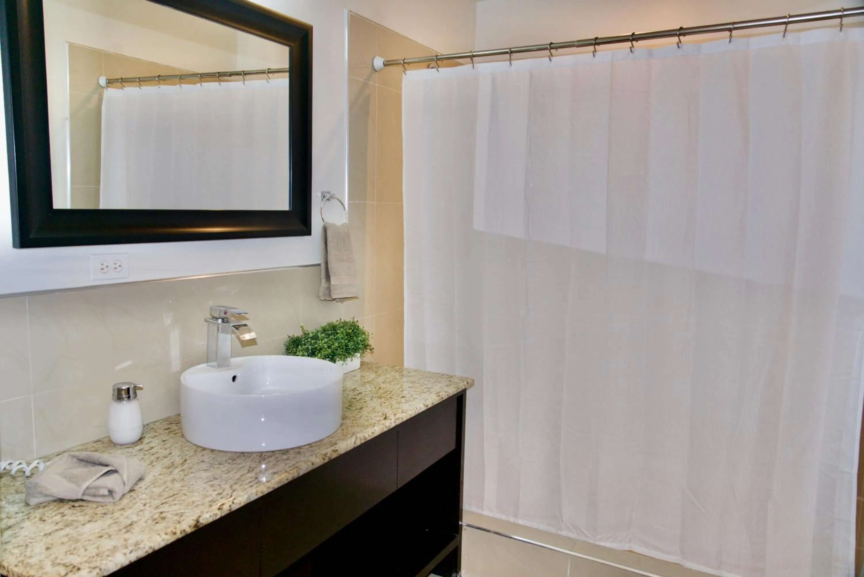Bathroom in Rio Suites