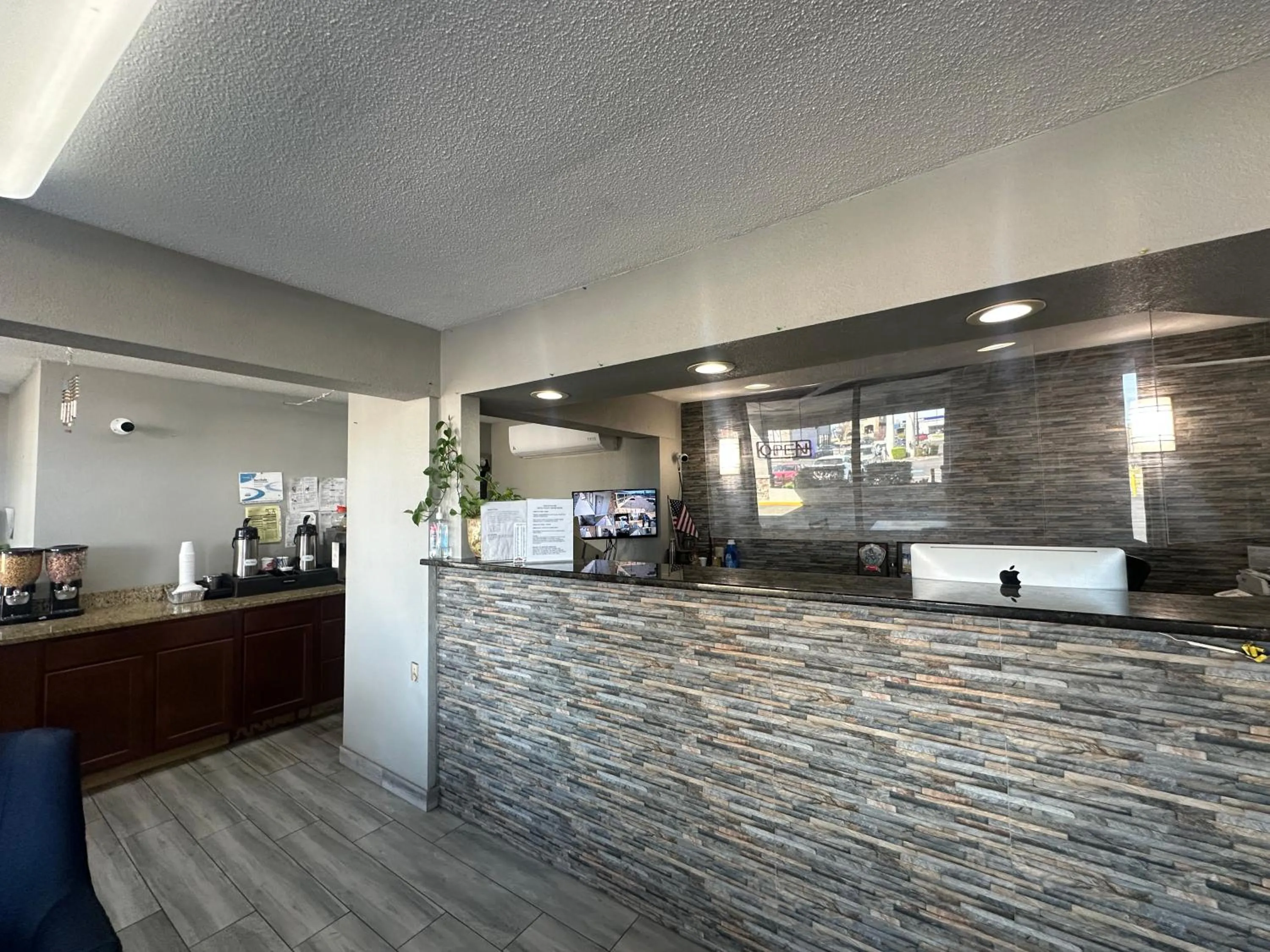 Lobby or reception in Executive Inn Locust Grove by Capital O