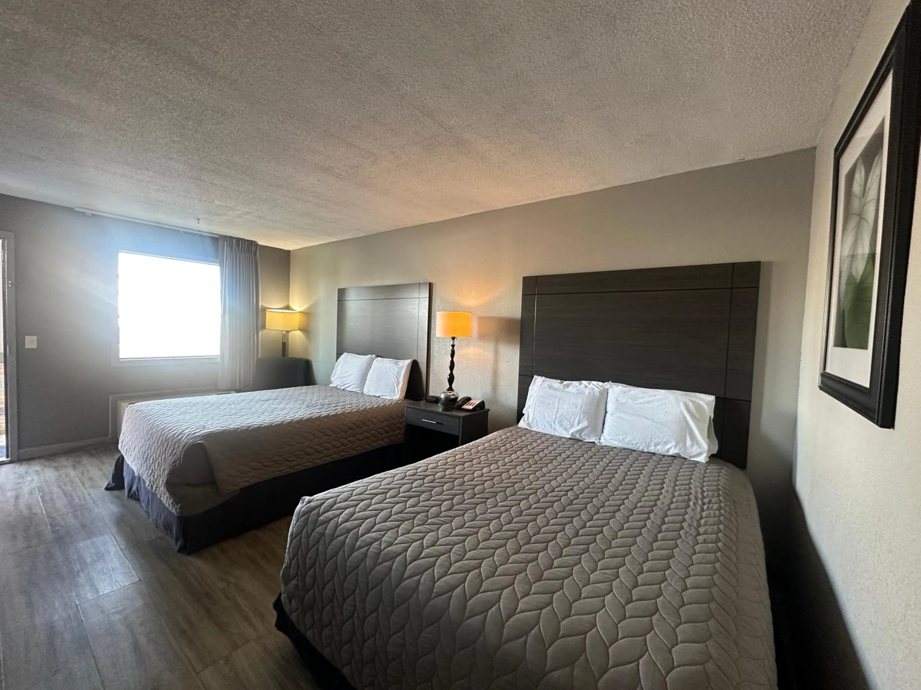 Bedroom in Executive Inn Locust Grove by Capital O