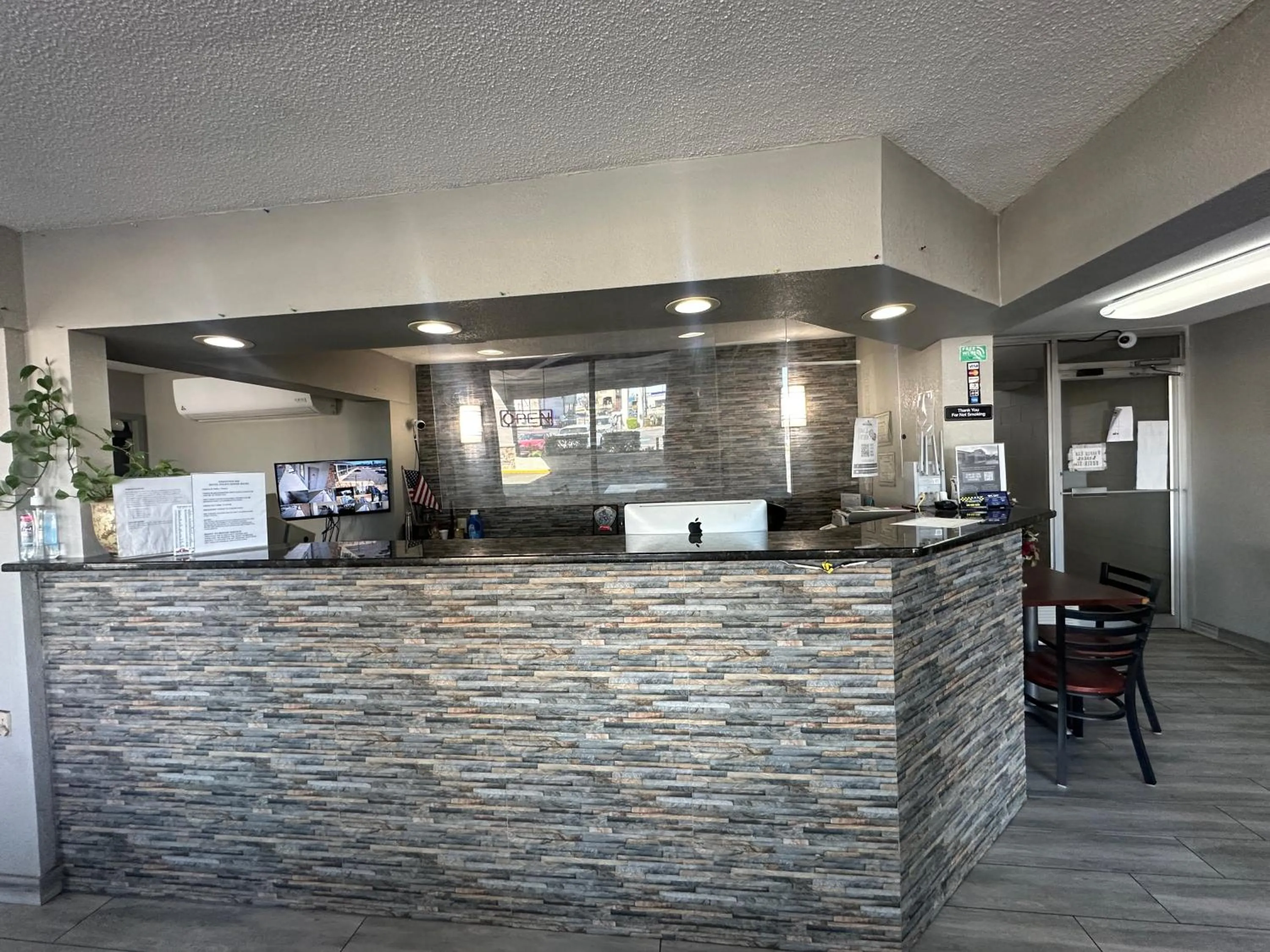 Lobby or reception in Executive Inn Locust Grove by Capital O