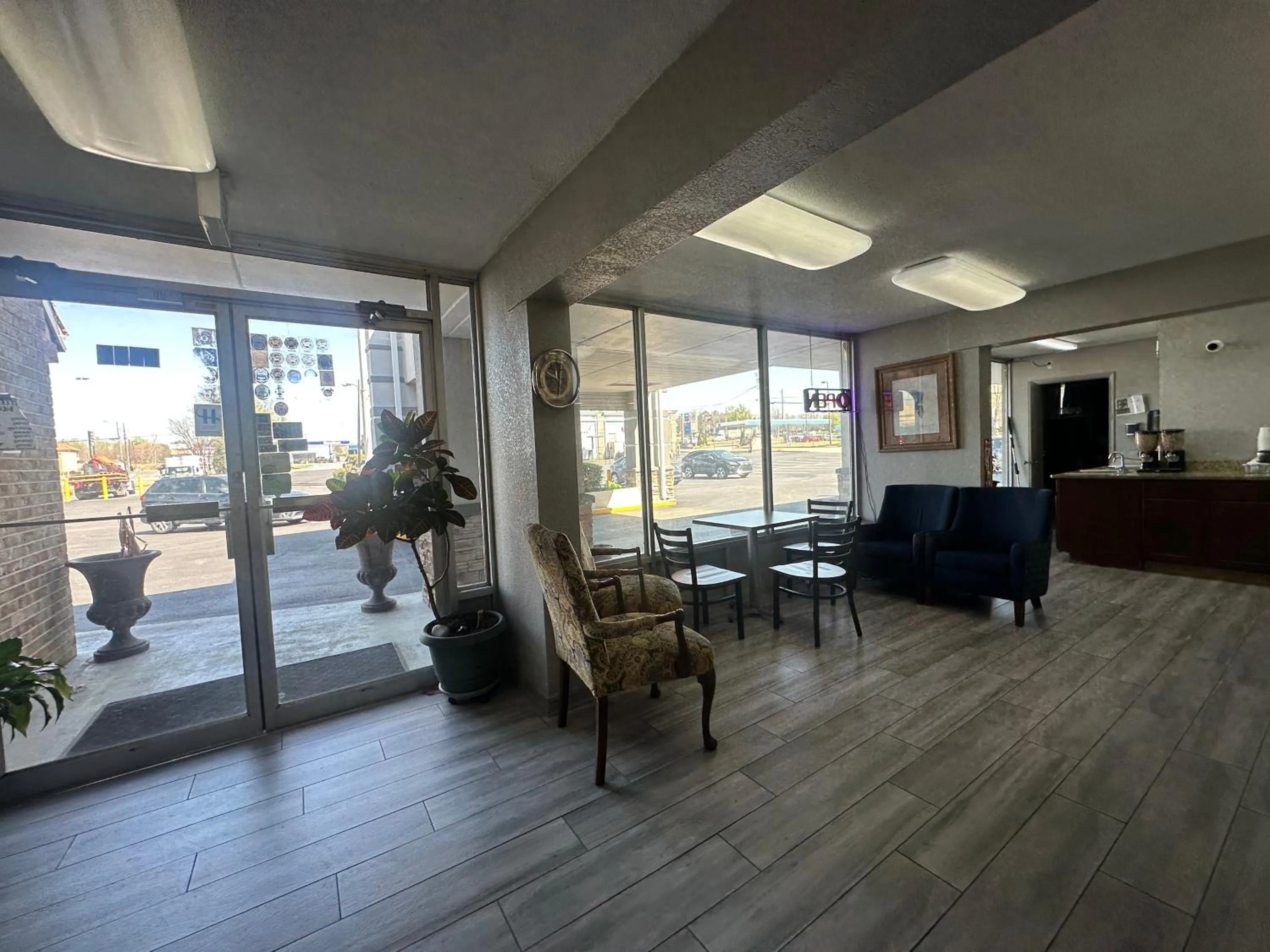 Lobby or reception in Executive Inn Locust Grove by Capital O