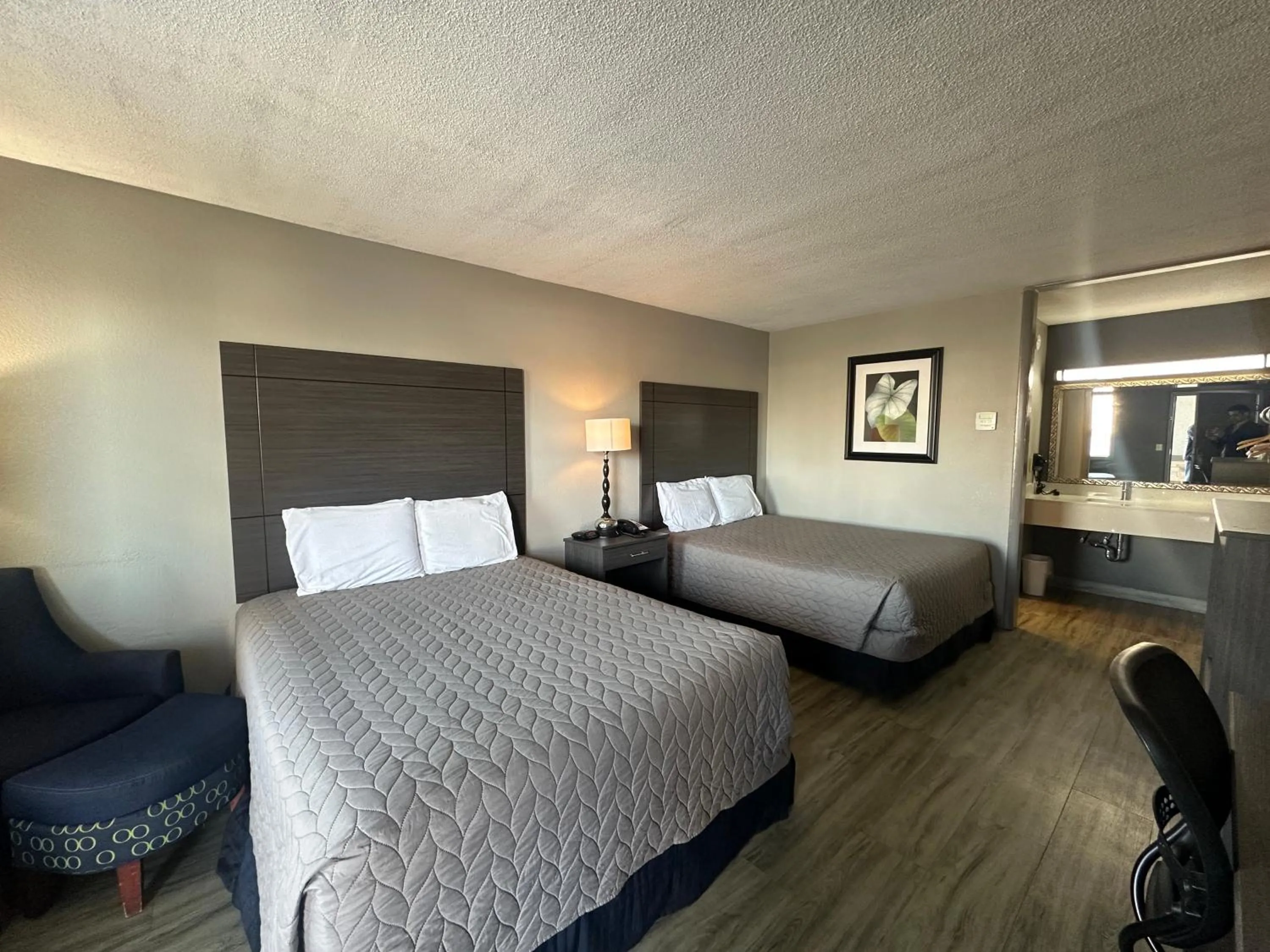 Bedroom in Executive Inn Locust Grove by Capital O