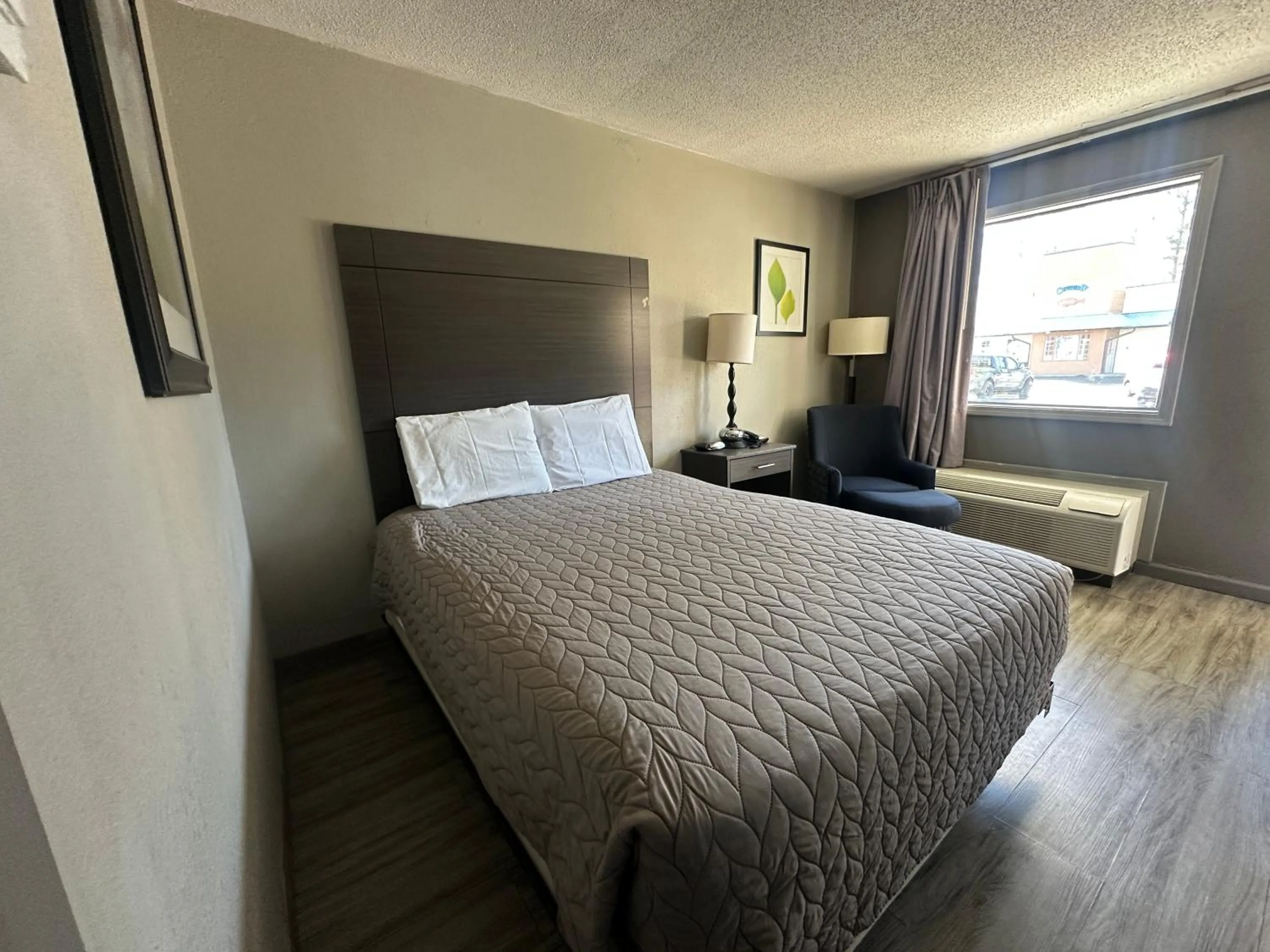 Bedroom in Executive Inn Locust Grove by Capital O