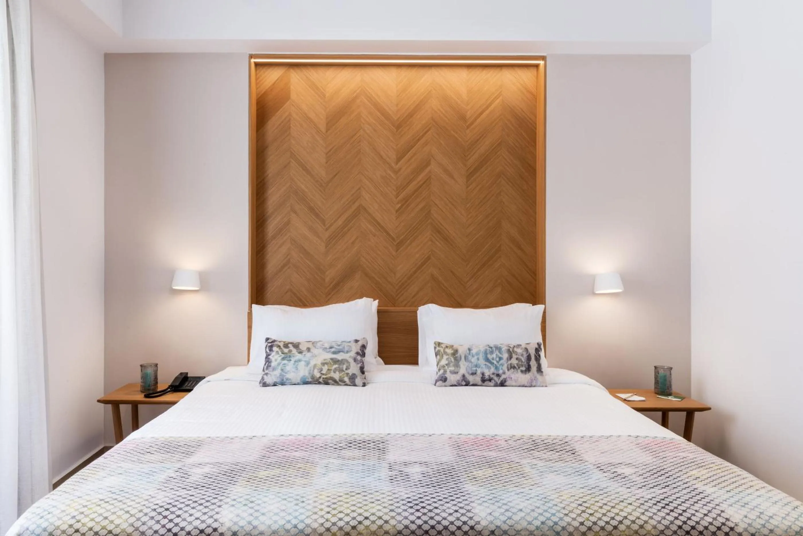 Bed in Avra Apartments Venetian Harbour